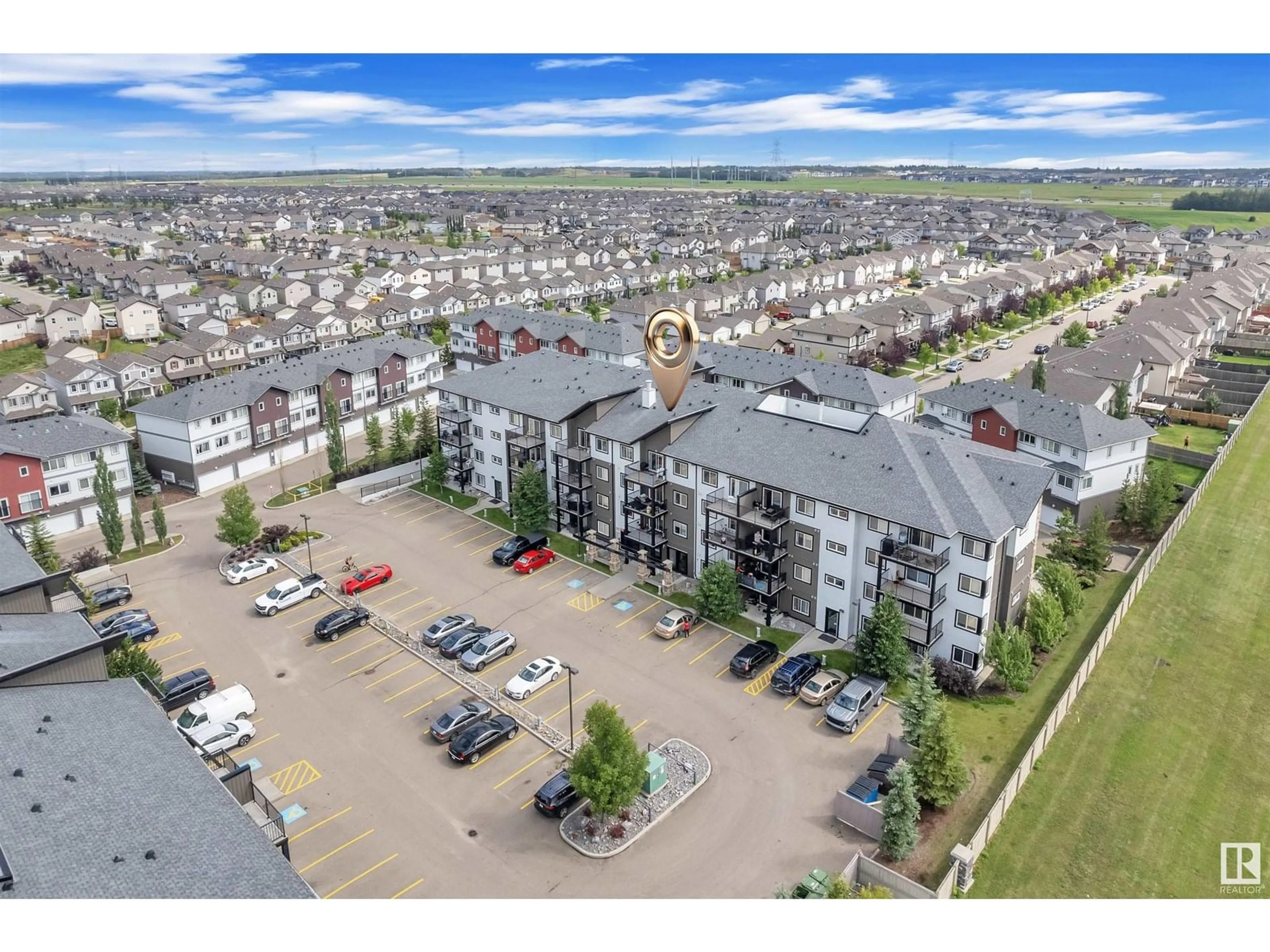 A pic from outside/outdoor area/front of a property/back of a property/a pic from drone, mountain view for #303 - 3353 16A AV, Edmonton Alberta T6T0V4