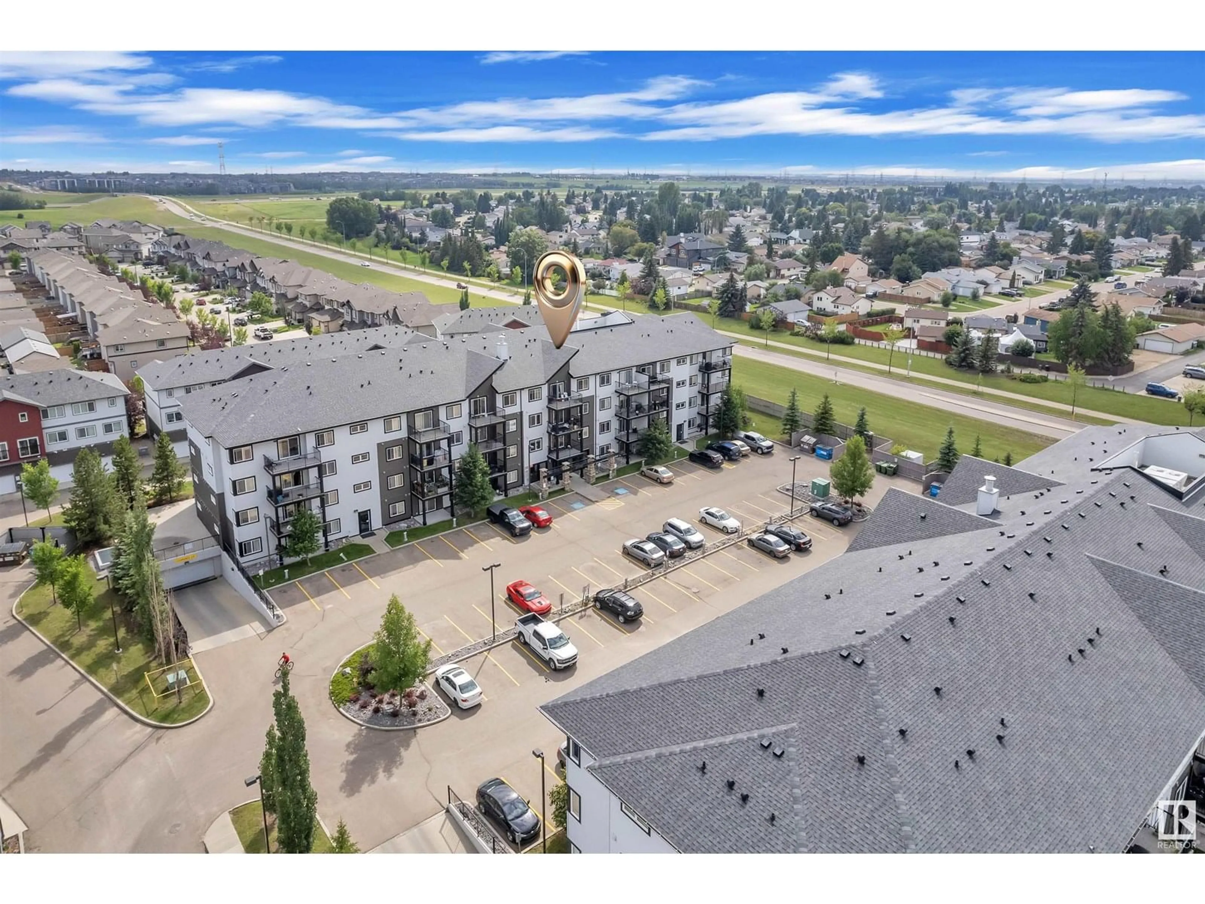 A pic from outside/outdoor area/front of a property/back of a property/a pic from drone, mountain view for #303 - 3353 16A AV, Edmonton Alberta T6T0V4