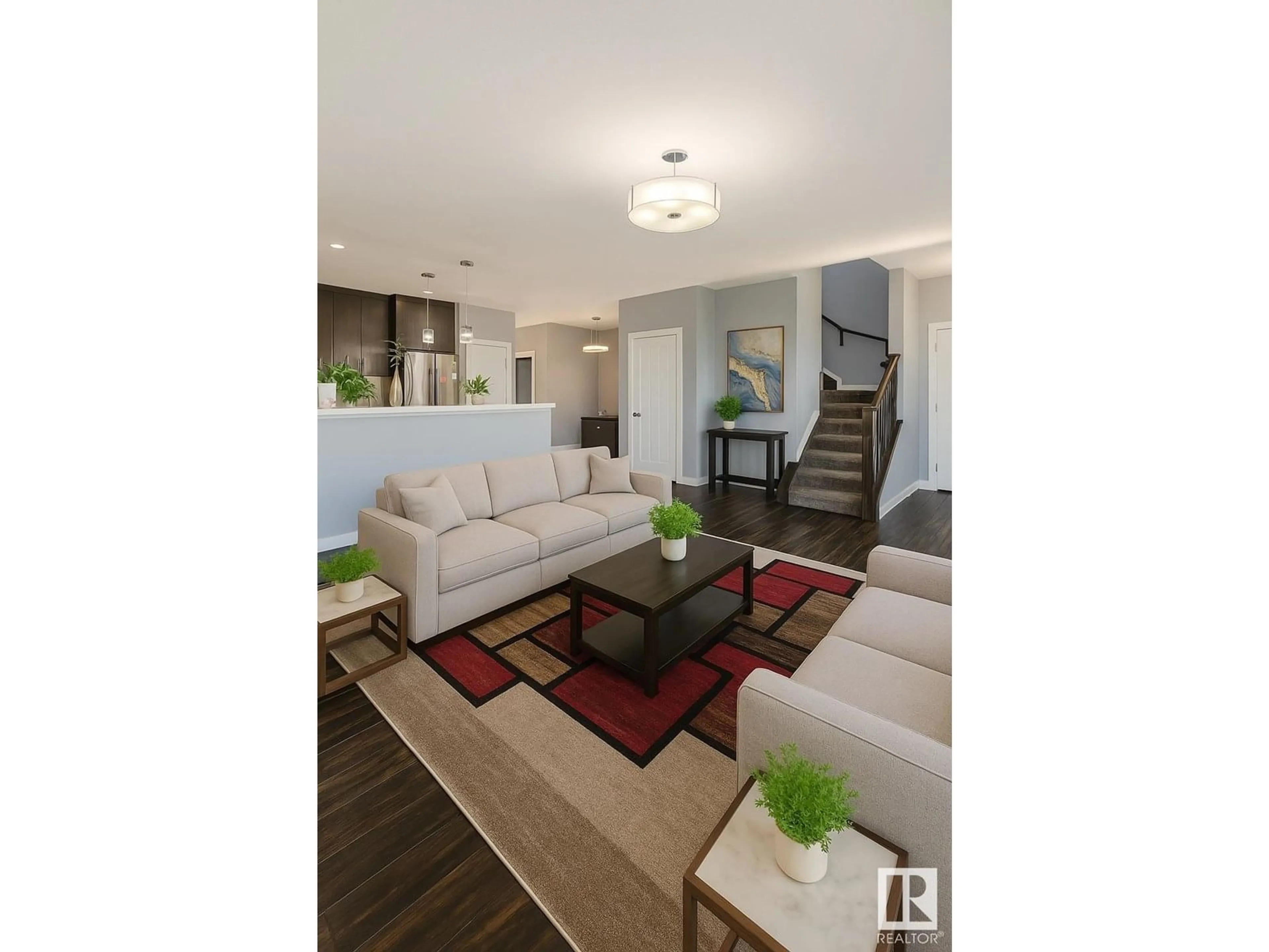 Living room with furniture, wood/laminate floor for 2720 11 ST, Edmonton Alberta T6T0X9