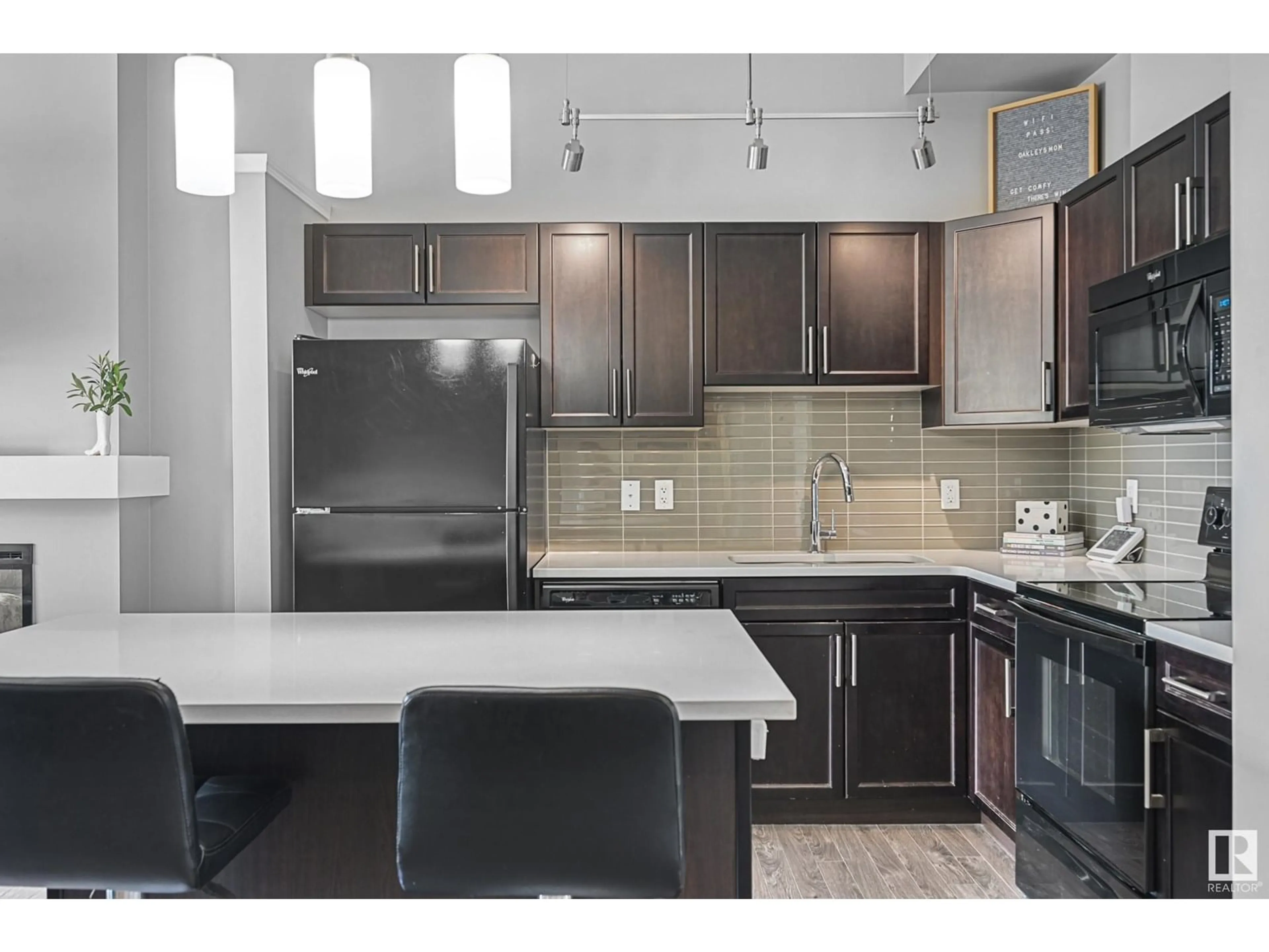 Open concept kitchen, ceramic/tile floor for #32 - 4029 ORCHARDS DR, Edmonton Alberta T6X1V2