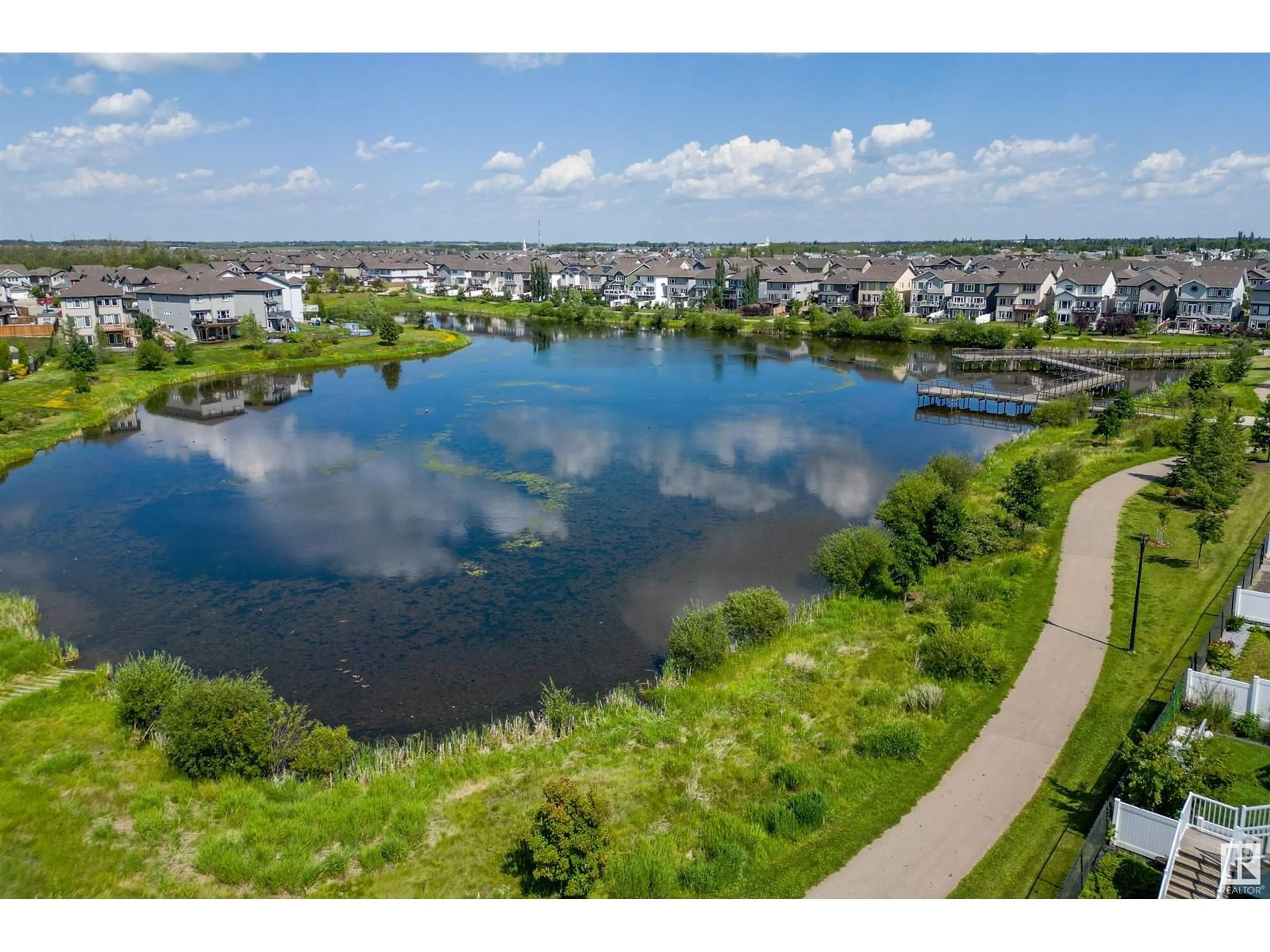 A pic from outside/outdoor area/front of a property/back of a property/a pic from drone, water/lake/river/ocean view for 12268 168 AV, Edmonton Alberta T5X0J1