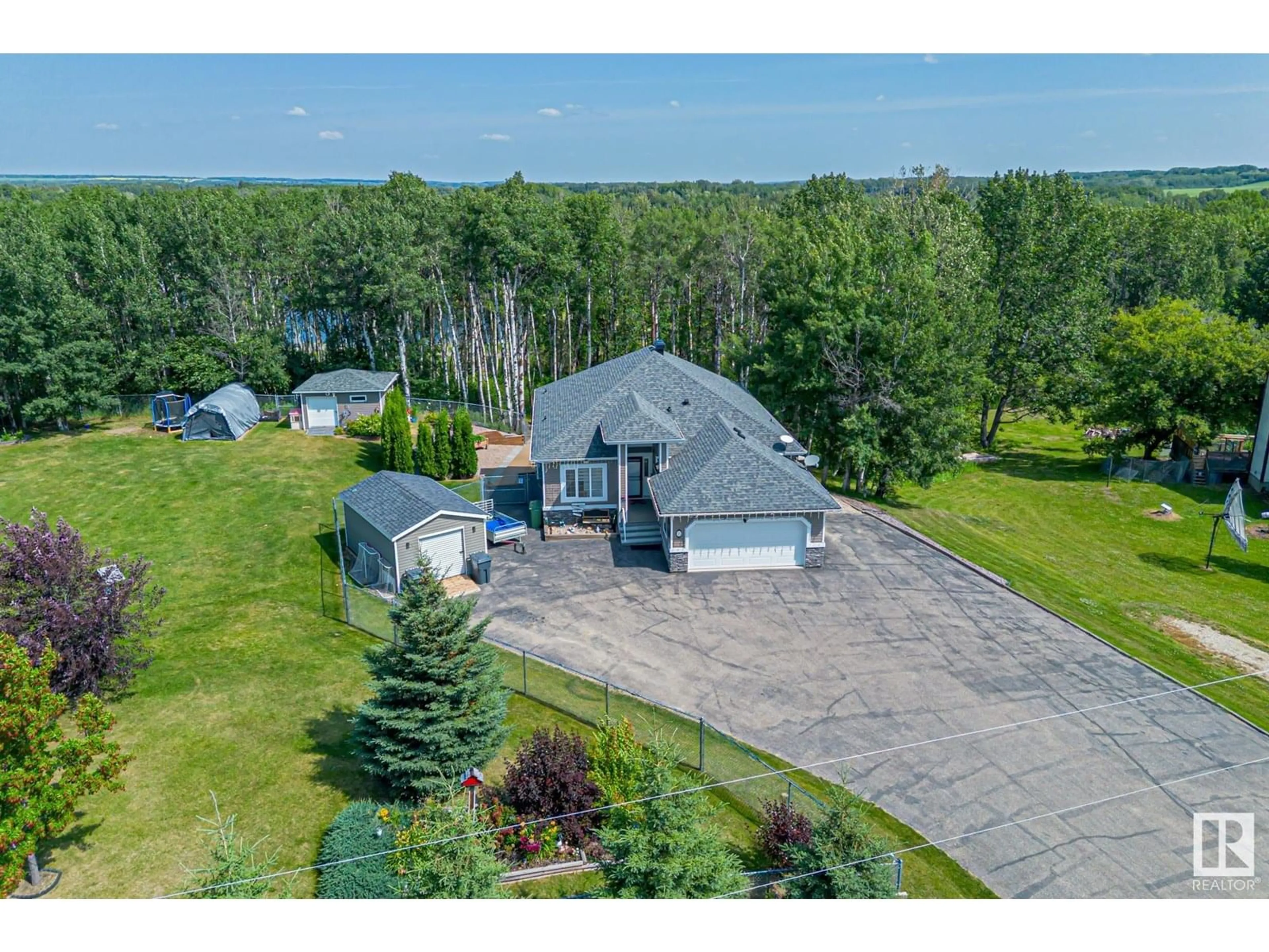 A pic from outside/outdoor area/front of a property/back of a property/a pic from drone, water/lake/river/ocean view for #17 - 2228 PARKLAND DR, Rural Parkland County Alberta T0E0H0