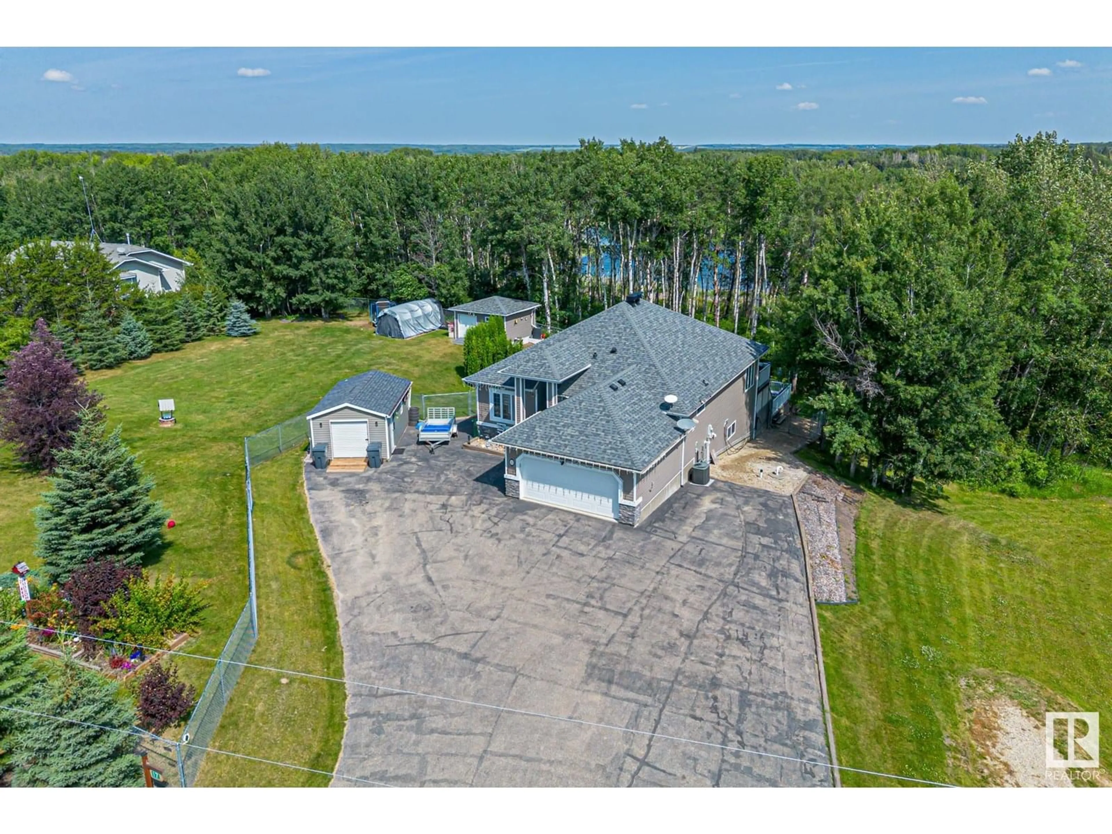 A pic from outside/outdoor area/front of a property/back of a property/a pic from drone, water/lake/river/ocean view for #17 - 2228 PARKLAND DR, Rural Parkland County Alberta T0E0H0