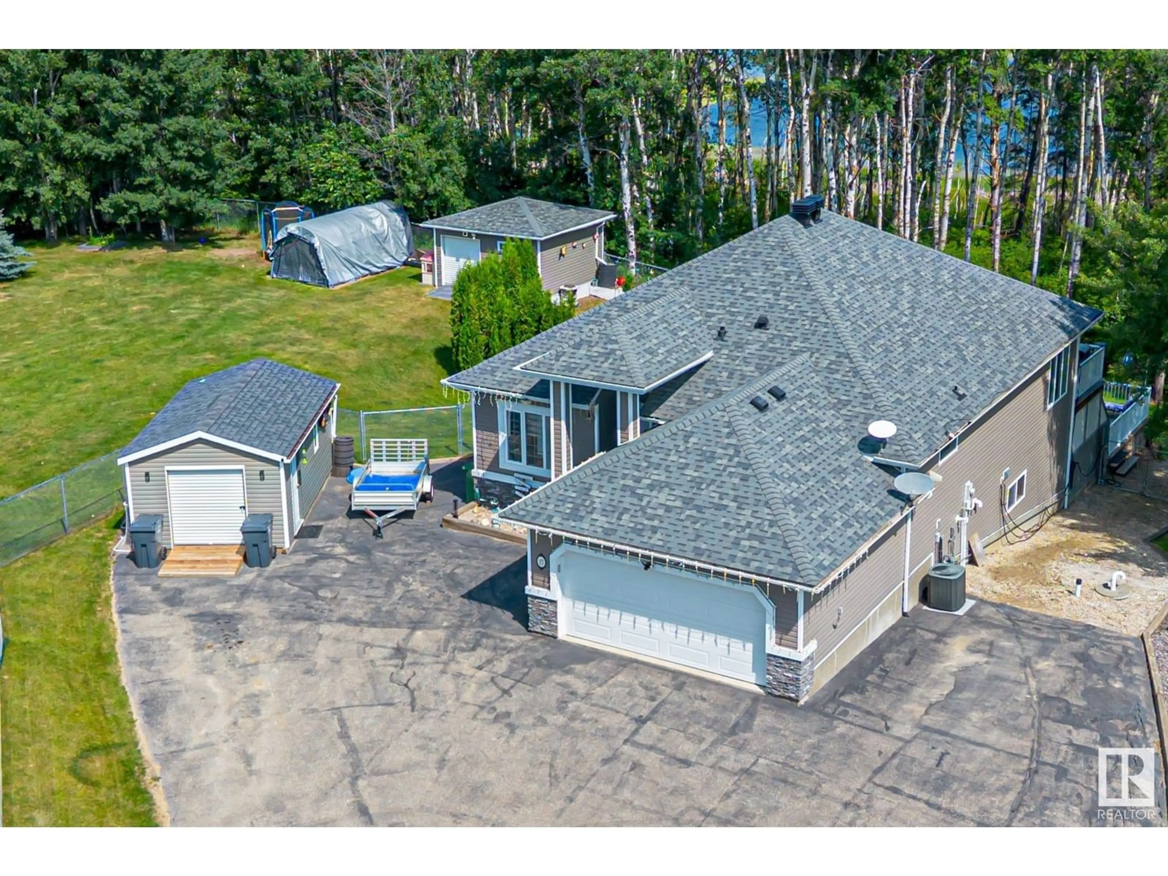 A pic from outside/outdoor area/front of a property/back of a property/a pic from drone, unknown for #17 - 2228 PARKLAND DR, Rural Parkland County Alberta T0E0H0