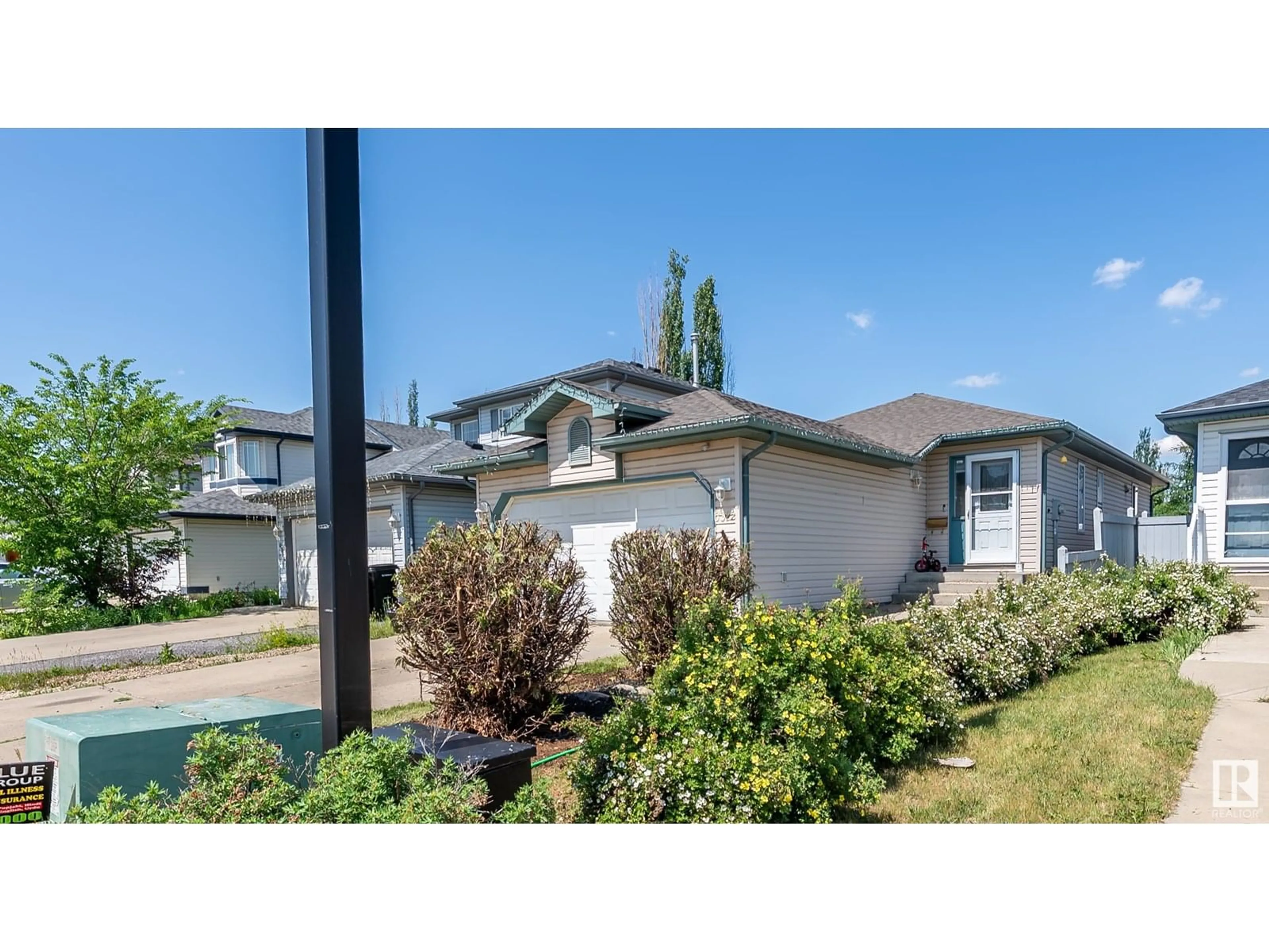 Home with vinyl exterior material, street for 3312 27 AVE, Edmonton Alberta T6T1P7