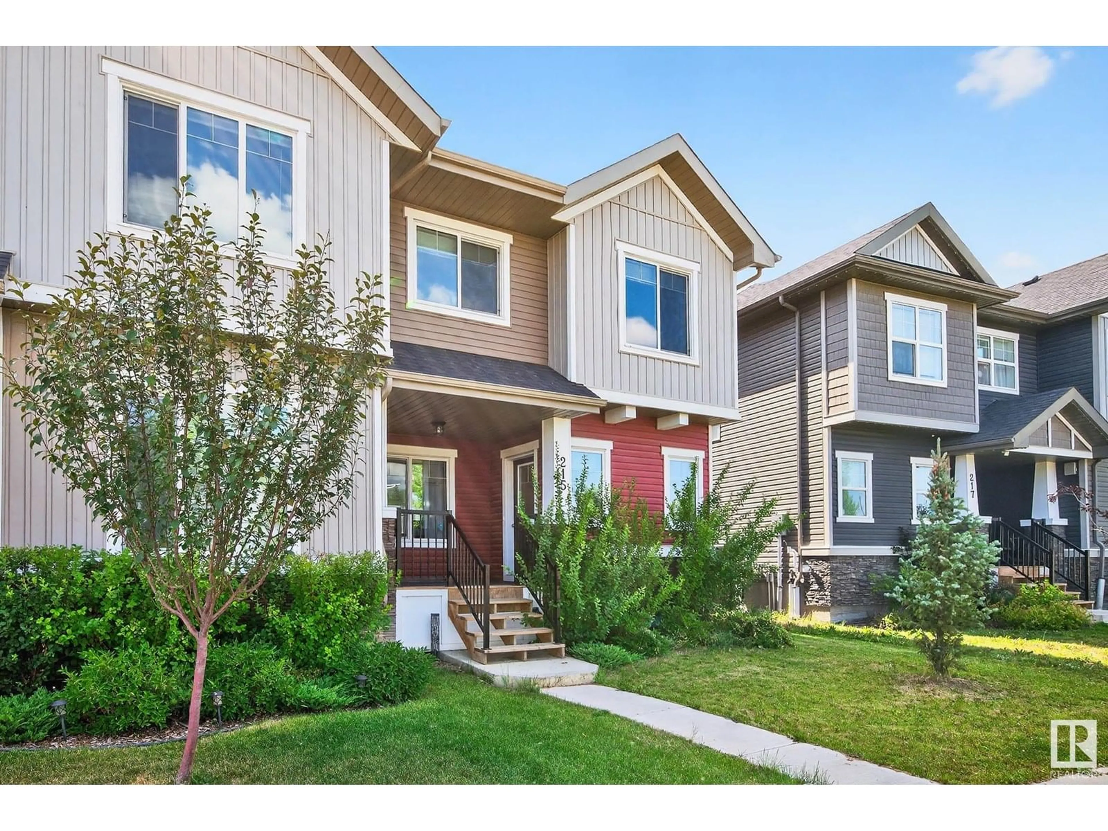 Home with vinyl exterior material, street for 215 GRIESBACH RD, Edmonton Alberta T5E6S5