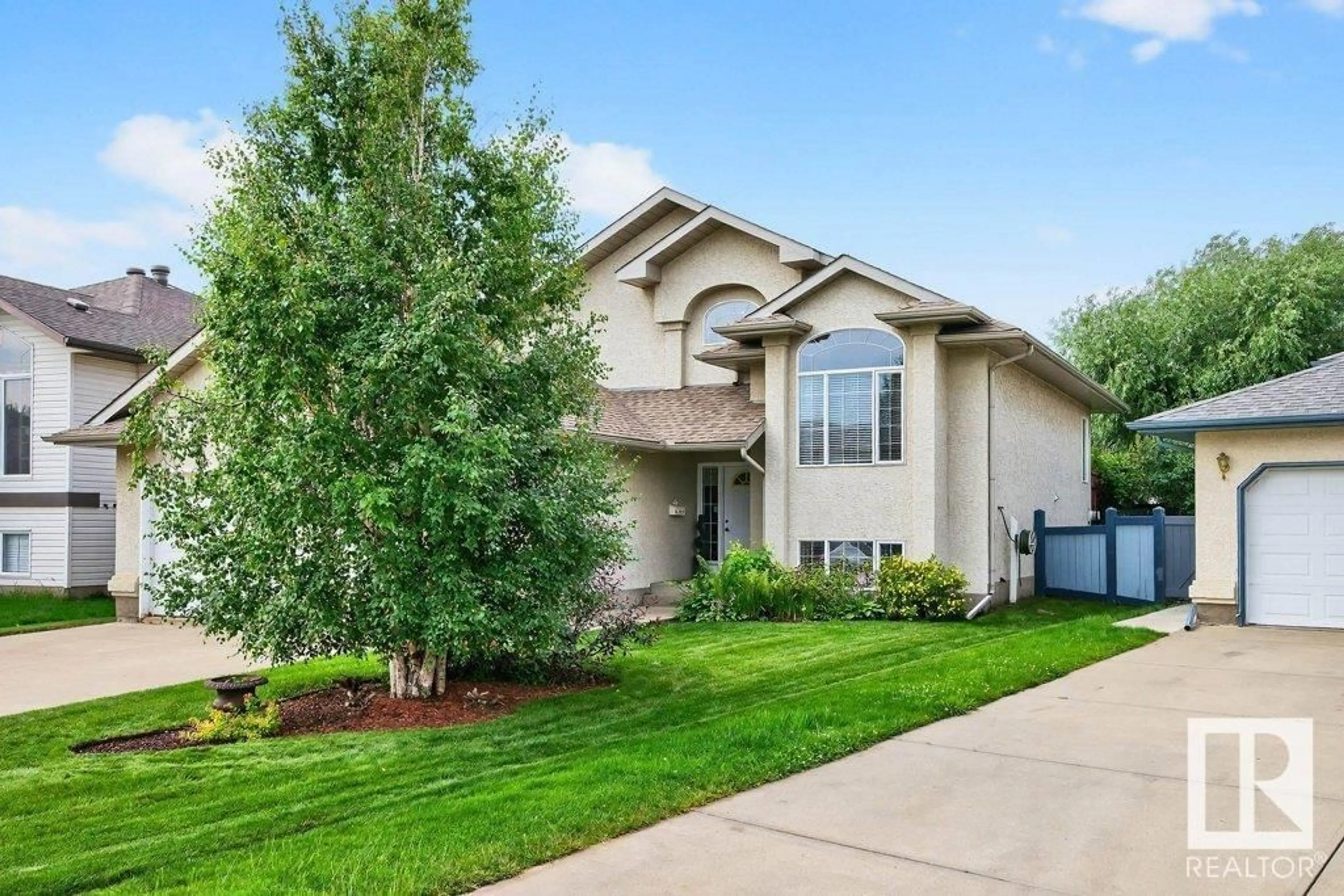 Home with vinyl exterior material, street for NW - 3812 42 ST, Edmonton Alberta T6L6Z6