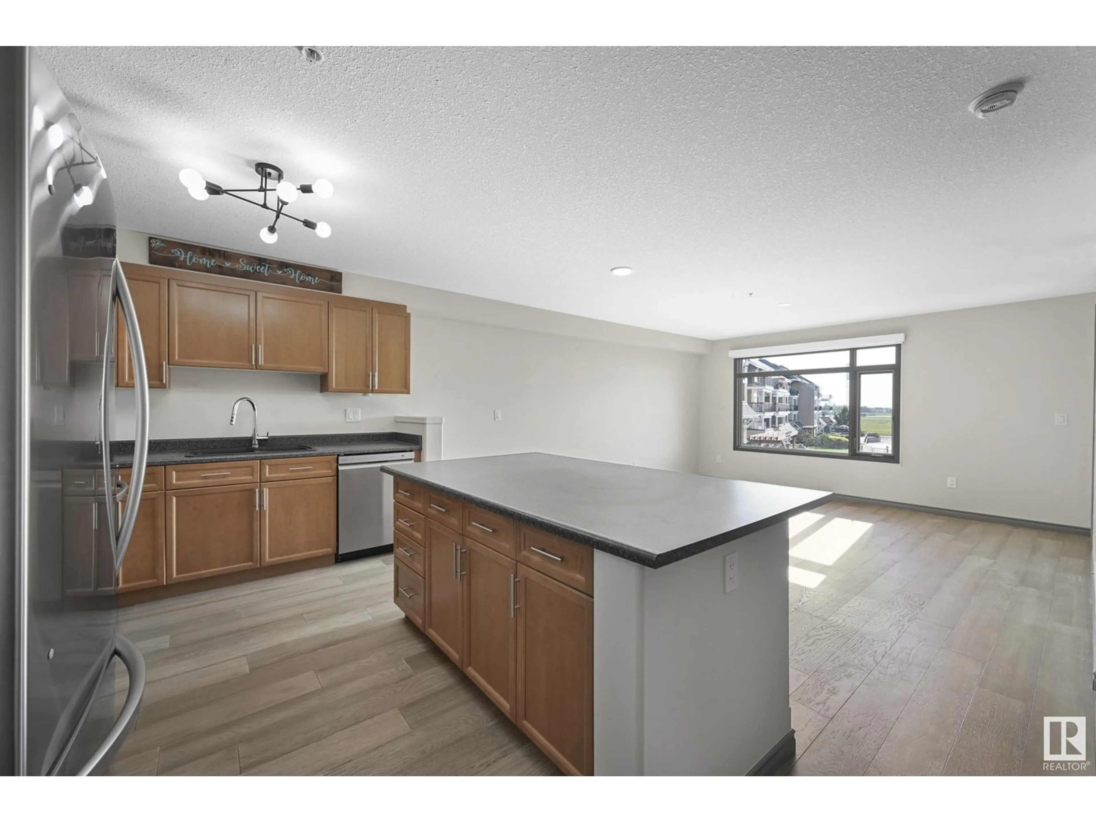 Open concept kitchen, unknown for 216 - 1589 GLASTONBURY BV, Edmonton Alberta T5T2V1