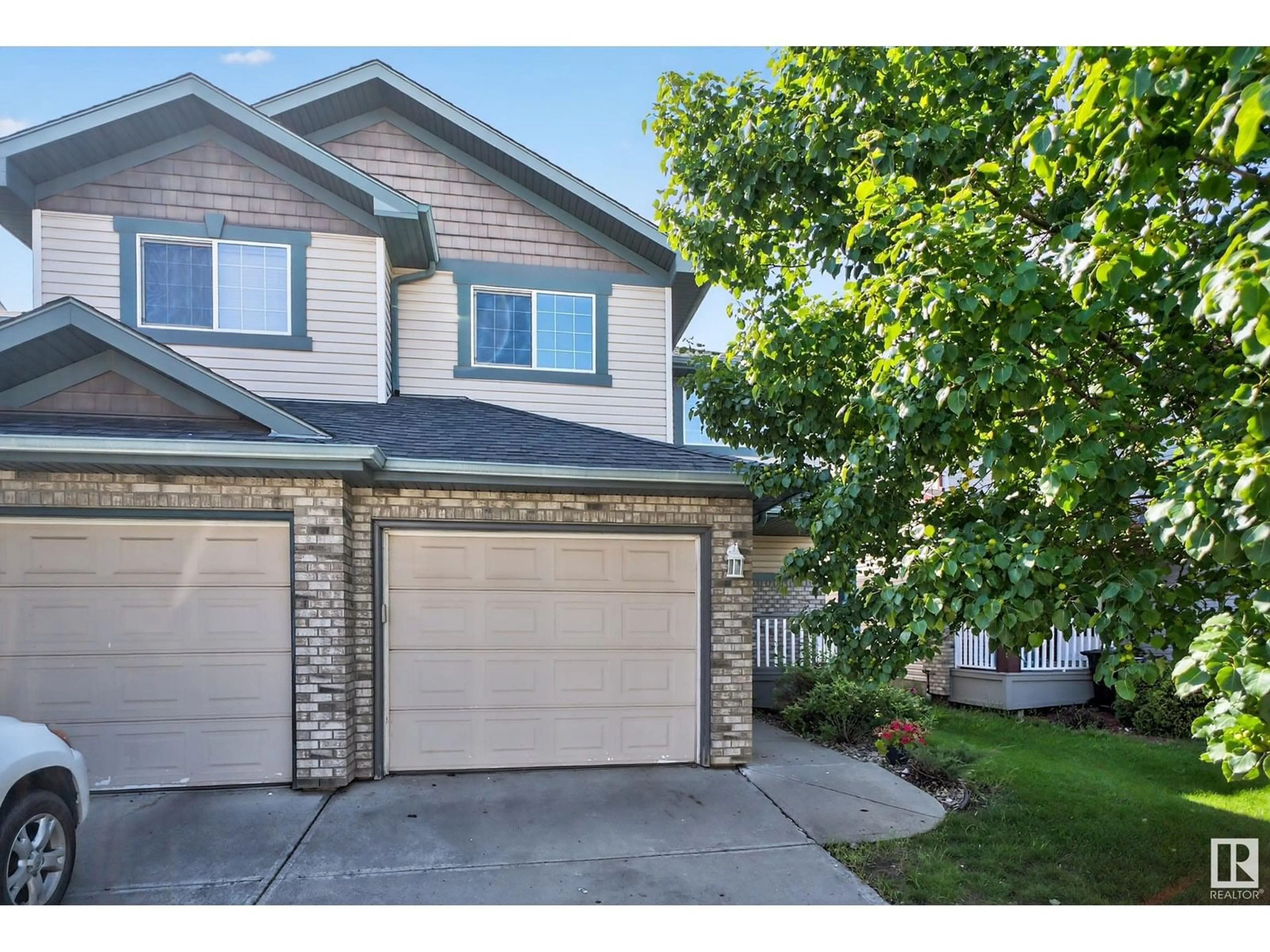Home with vinyl exterior material, street for 9135 SCOTT CR, Edmonton Alberta T6R0E5