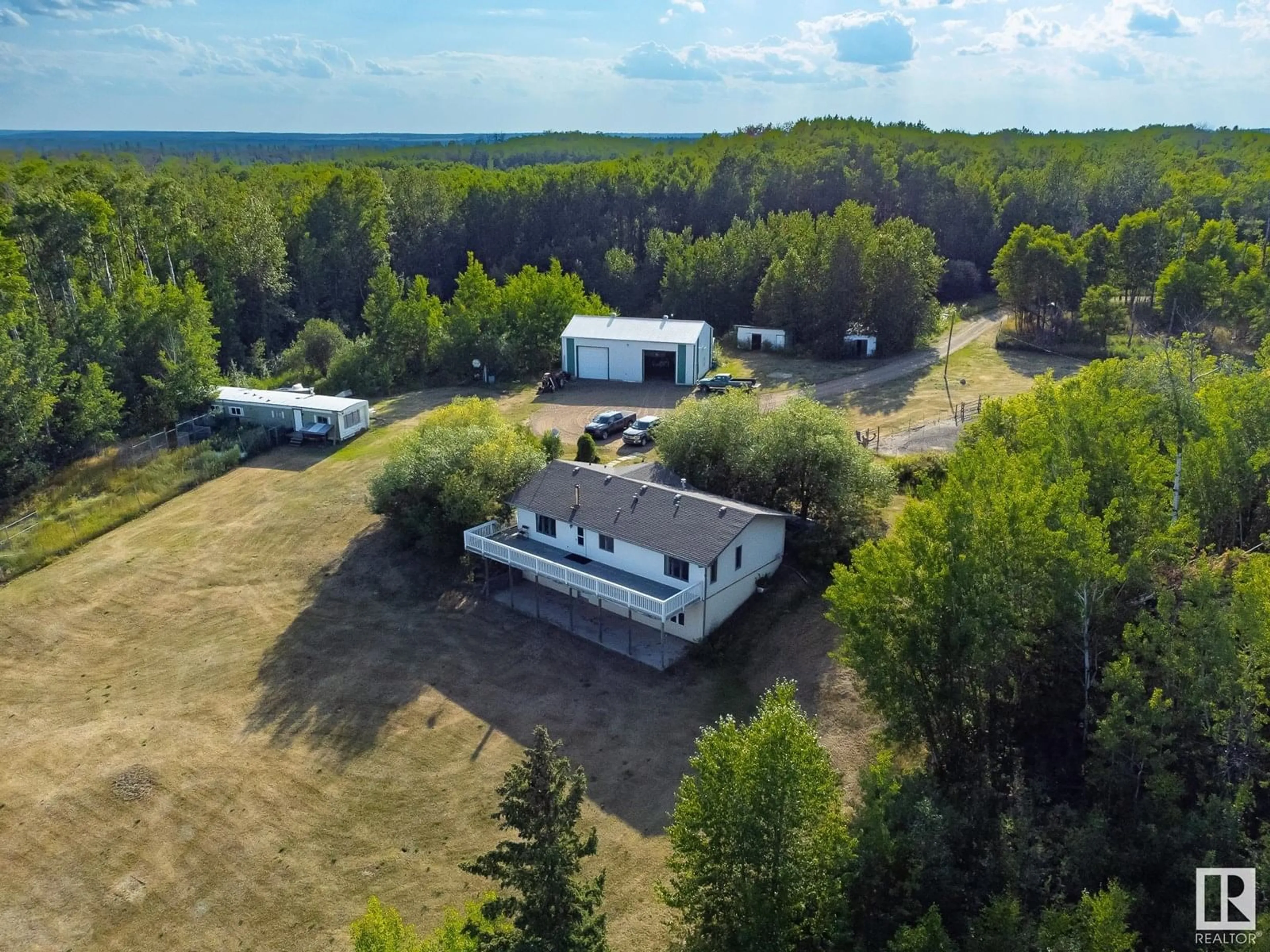 A pic from outside/outdoor area/front of a property/back of a property/a pic from drone, unknown for 11219 TOWNSHIP ROAD 640 A, Rural Lac La Biche County Alberta T0A2C0