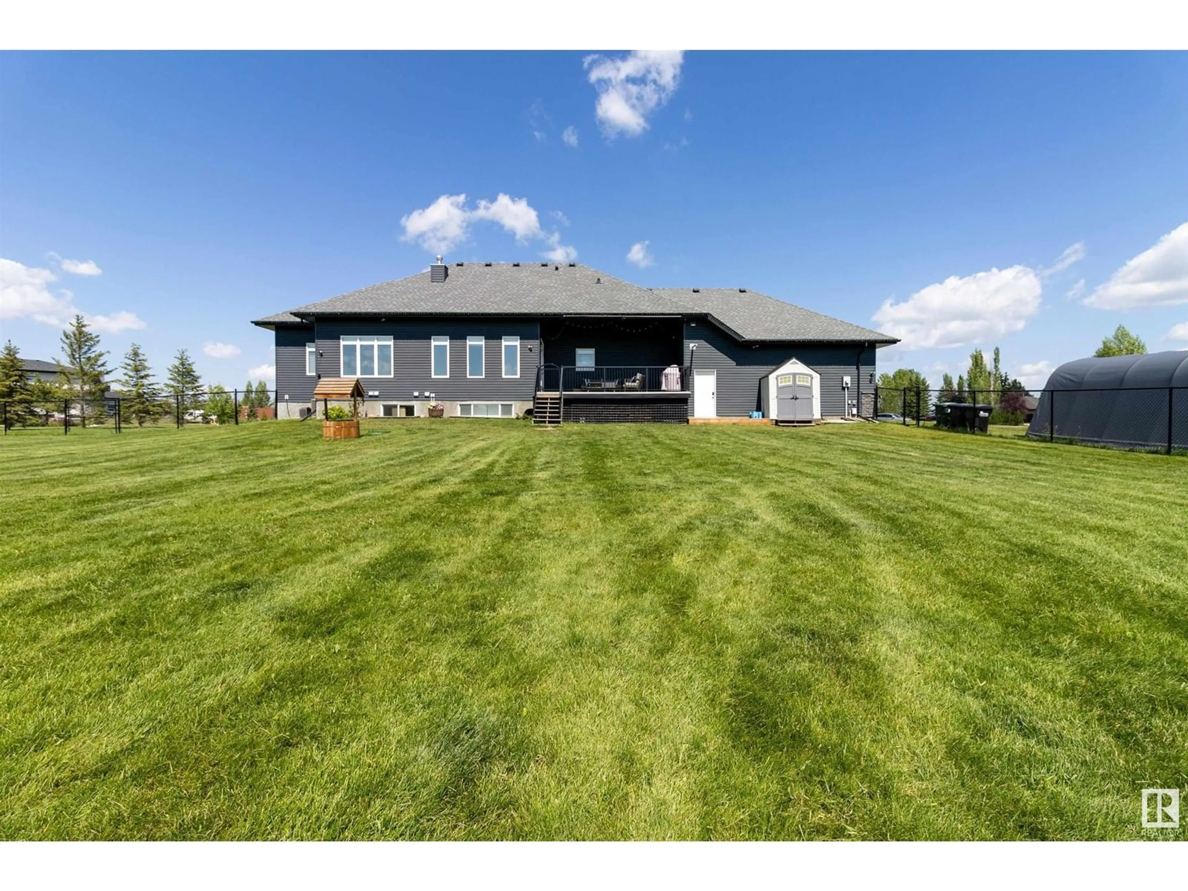 A pic from outside/outdoor area/front of a property/back of a property/a pic from drone, unknown for 385 52422 RGE ROAD 224, Rural Strathcona County Alberta T8A6N1