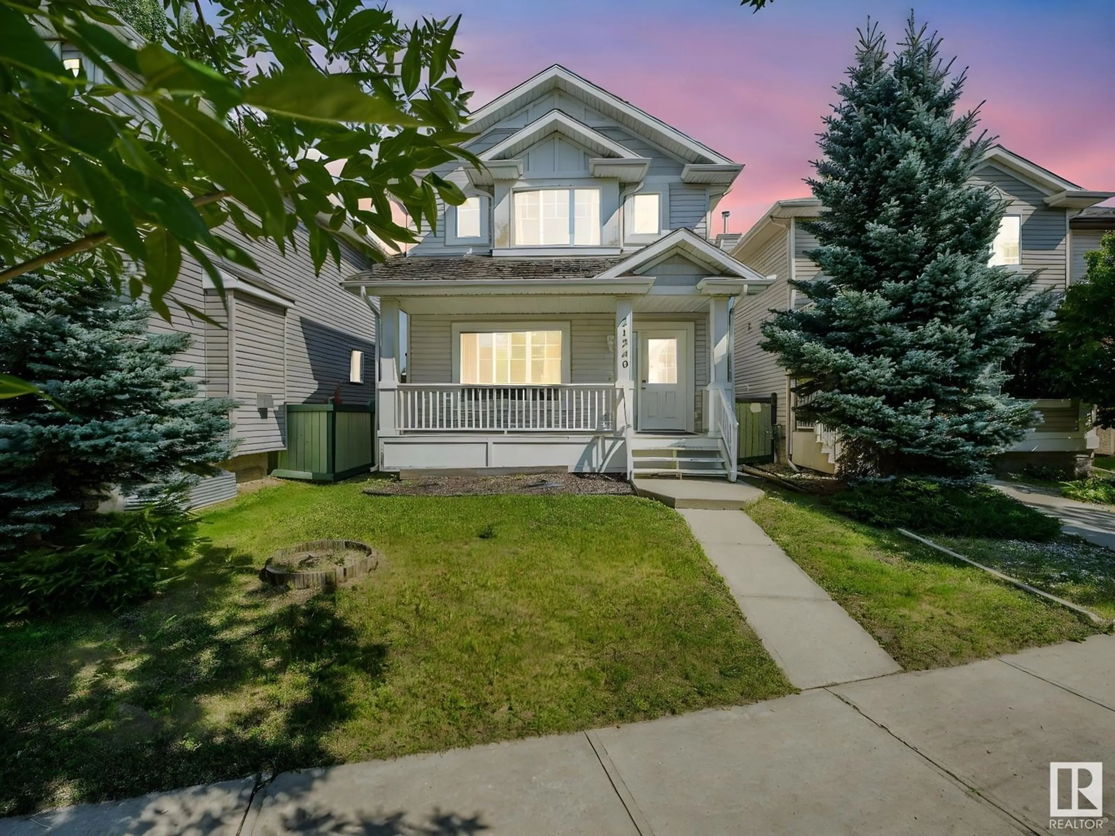 Home with vinyl exterior material, street for 21240 91 AV, Edmonton Alberta T5T0W4