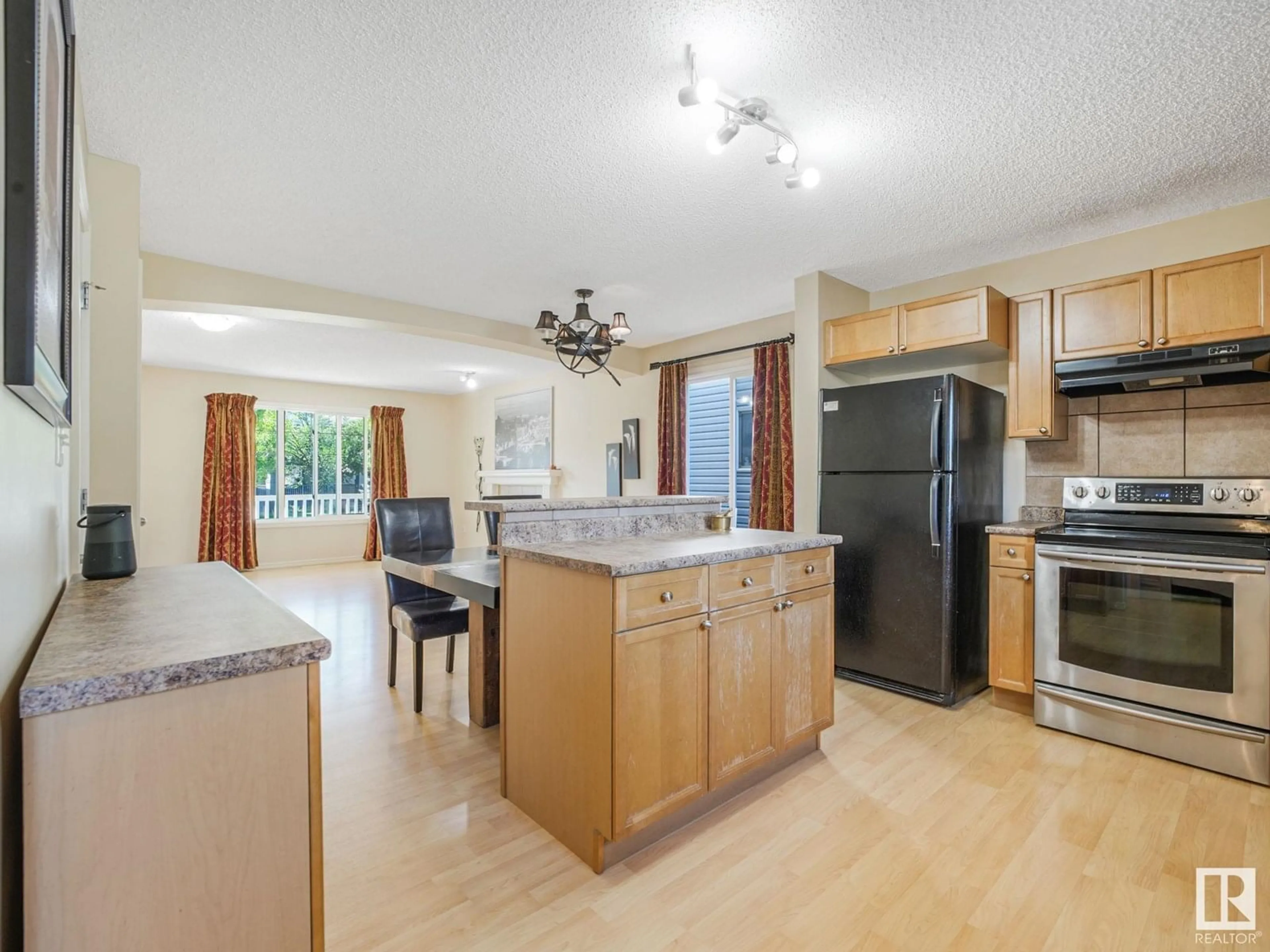 Open concept kitchen, unknown for 21240 91 AV, Edmonton Alberta T5T0W4