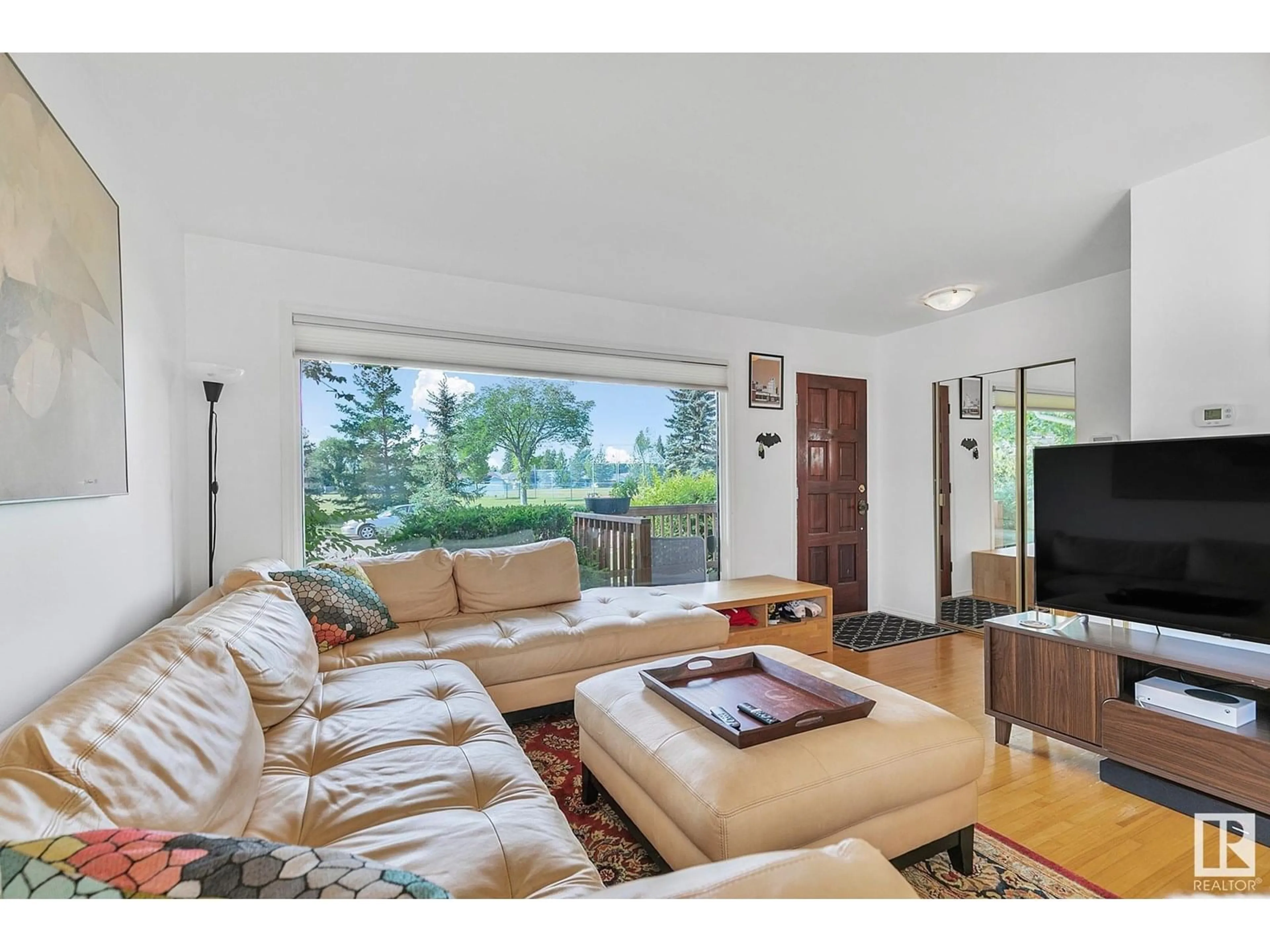 Living room with furniture, unknown for 15614 81 AV, Edmonton Alberta T5R3P4