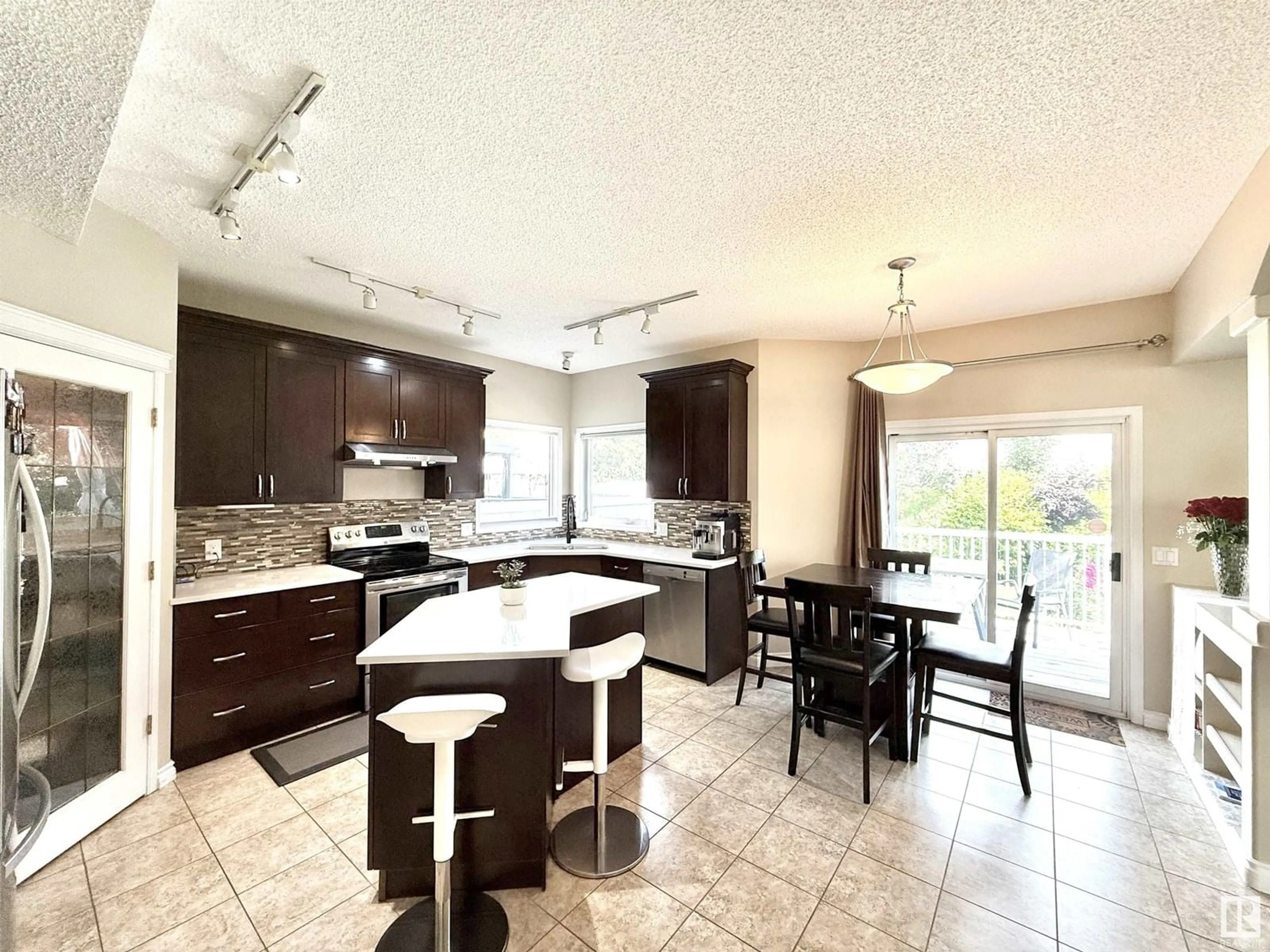 Open concept kitchen, ceramic/tile floor for NW - 706 ORMSBY W, Edmonton Alberta T5T6E4