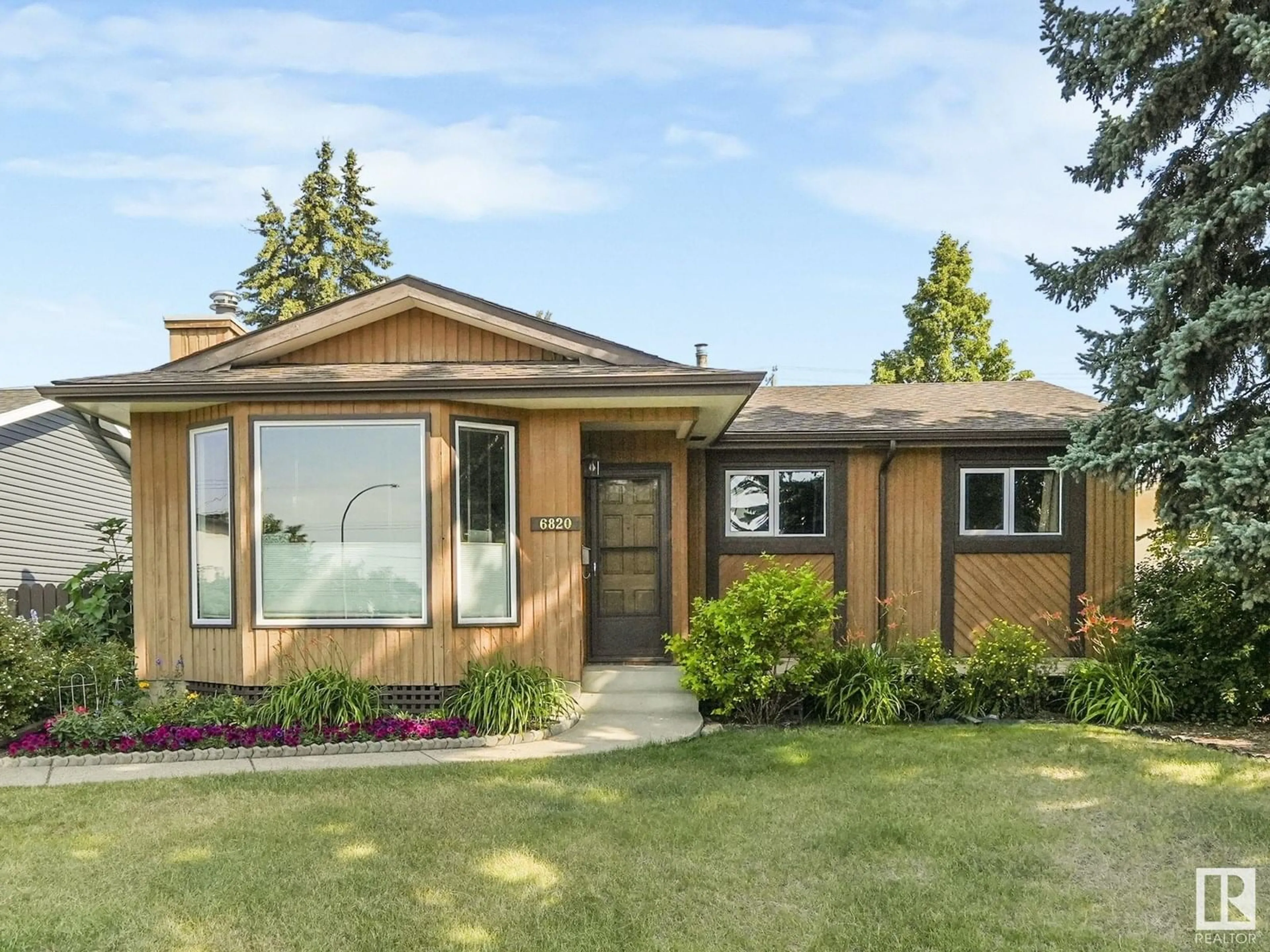 Home with brick exterior material, street for 6820 136 AV, Edmonton Alberta T5C2J9