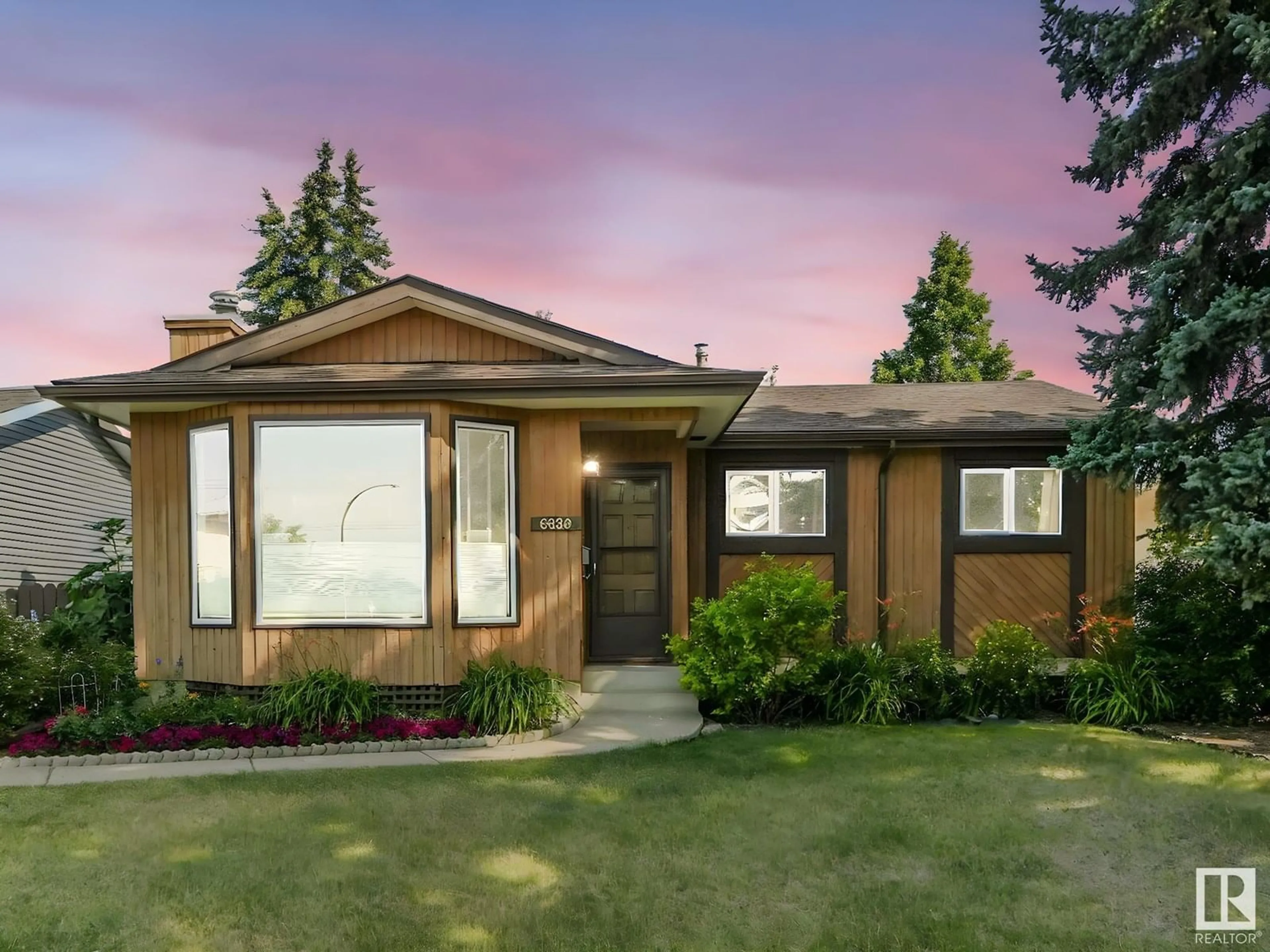 Home with brick exterior material, street for 6820 136 AV, Edmonton Alberta T5C2J9