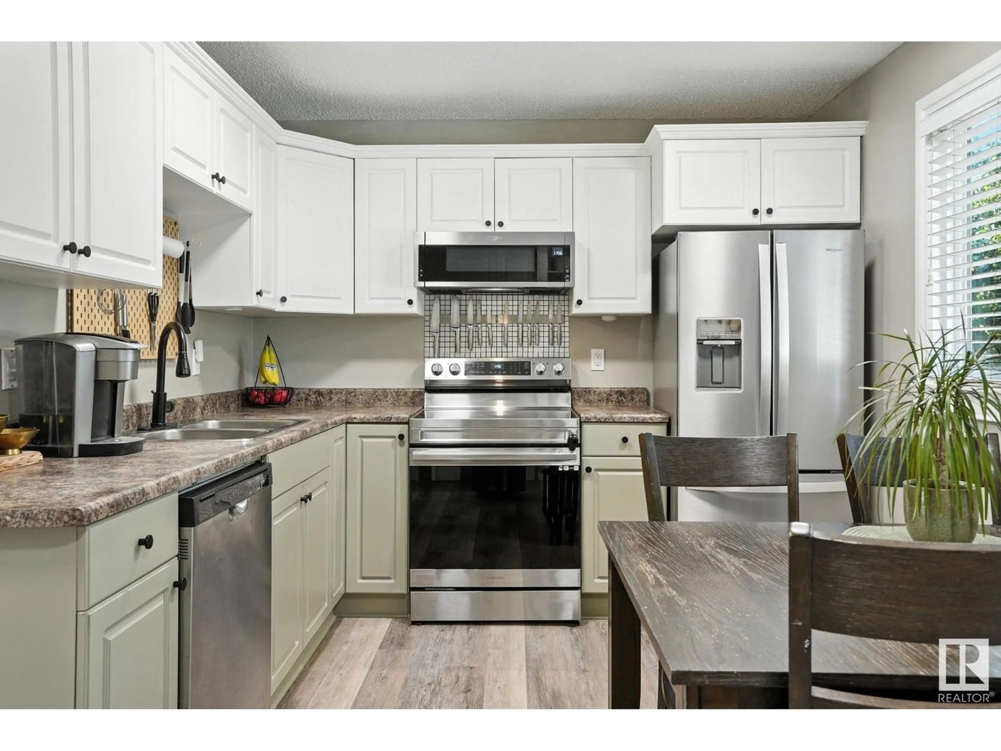 Open concept kitchen, unknown for 18032 93 AV, Edmonton Alberta T5T1Y1
