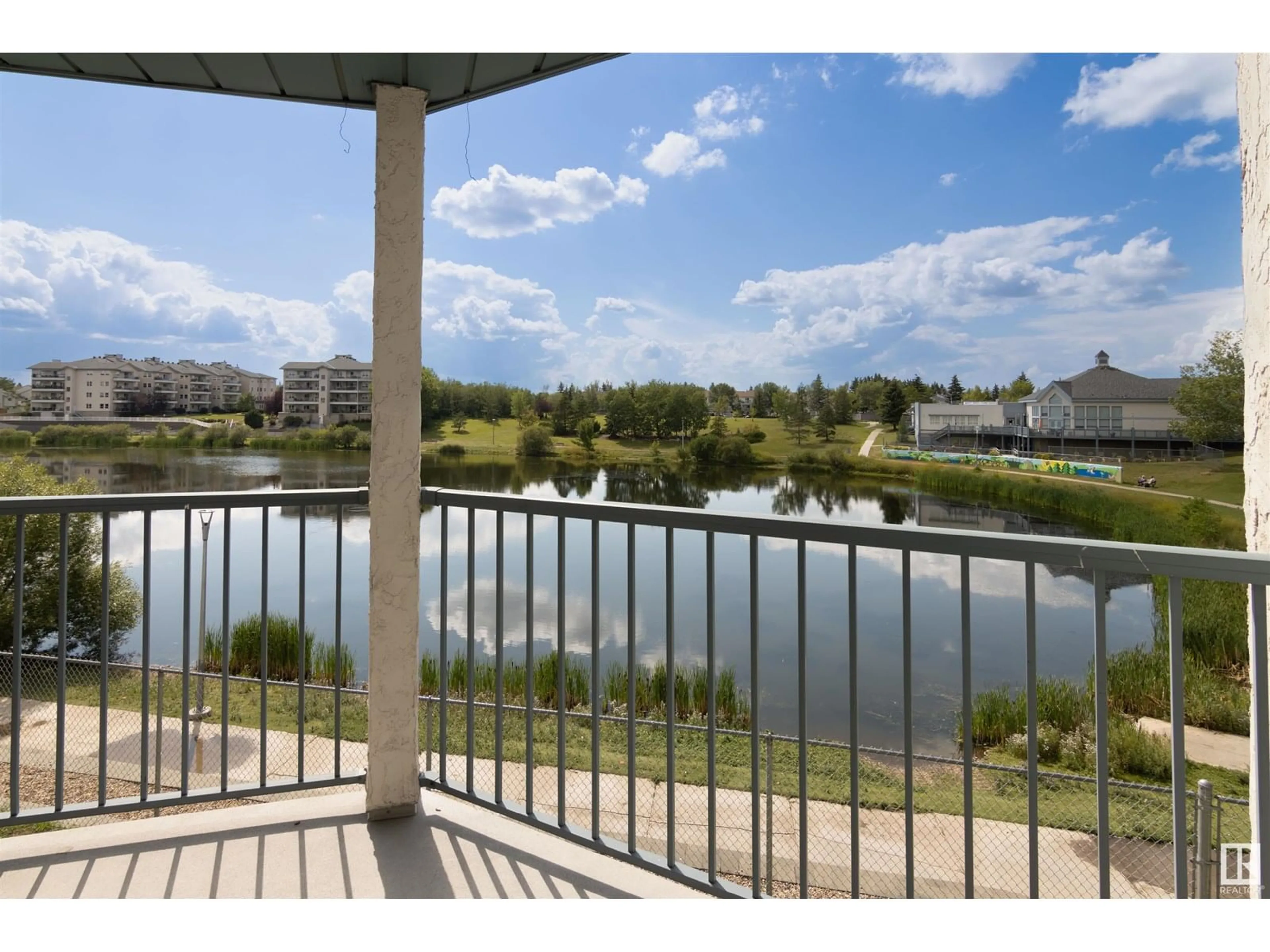 Patio, water/lake/river/ocean view for 9620 - 236 174 ST, Edmonton Alberta T5T6B9