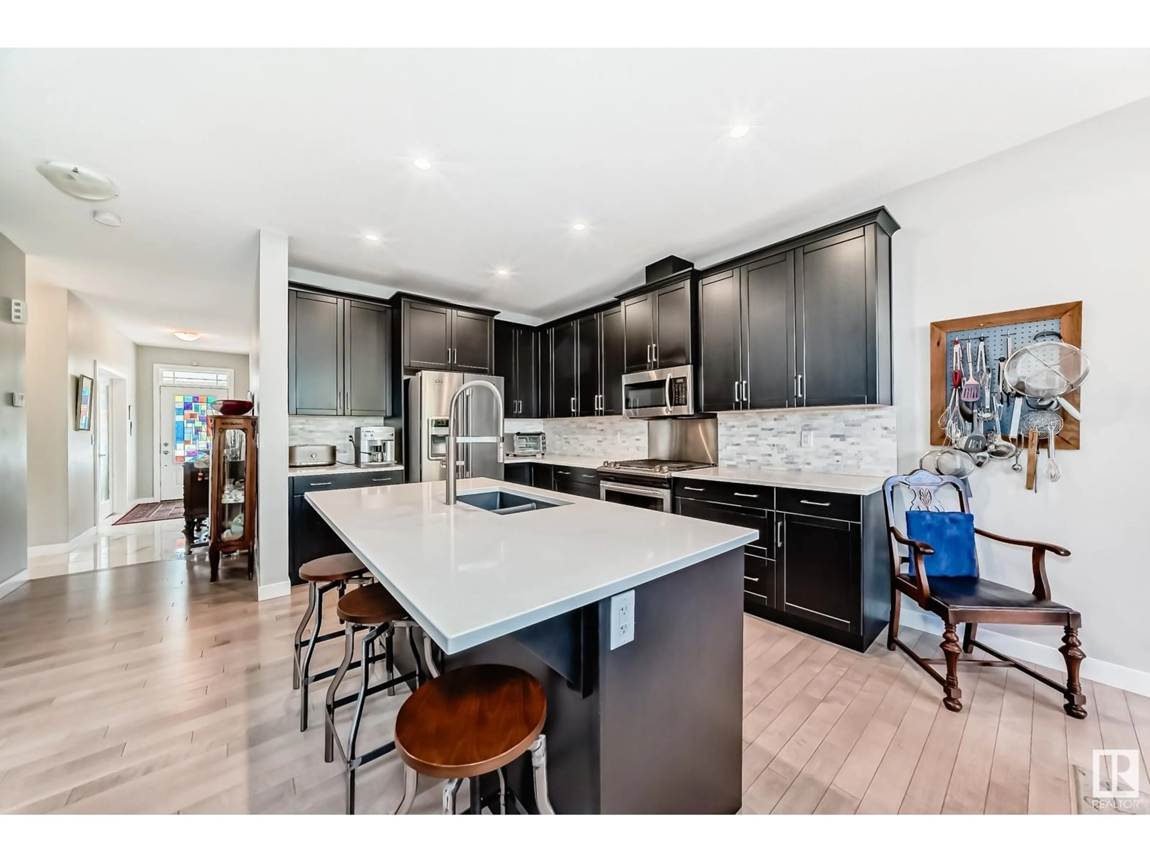 Open concept kitchen, ceramic/tile floor for 71 ROSEMOUNT BV, Beaumont Alberta T4X1Z5