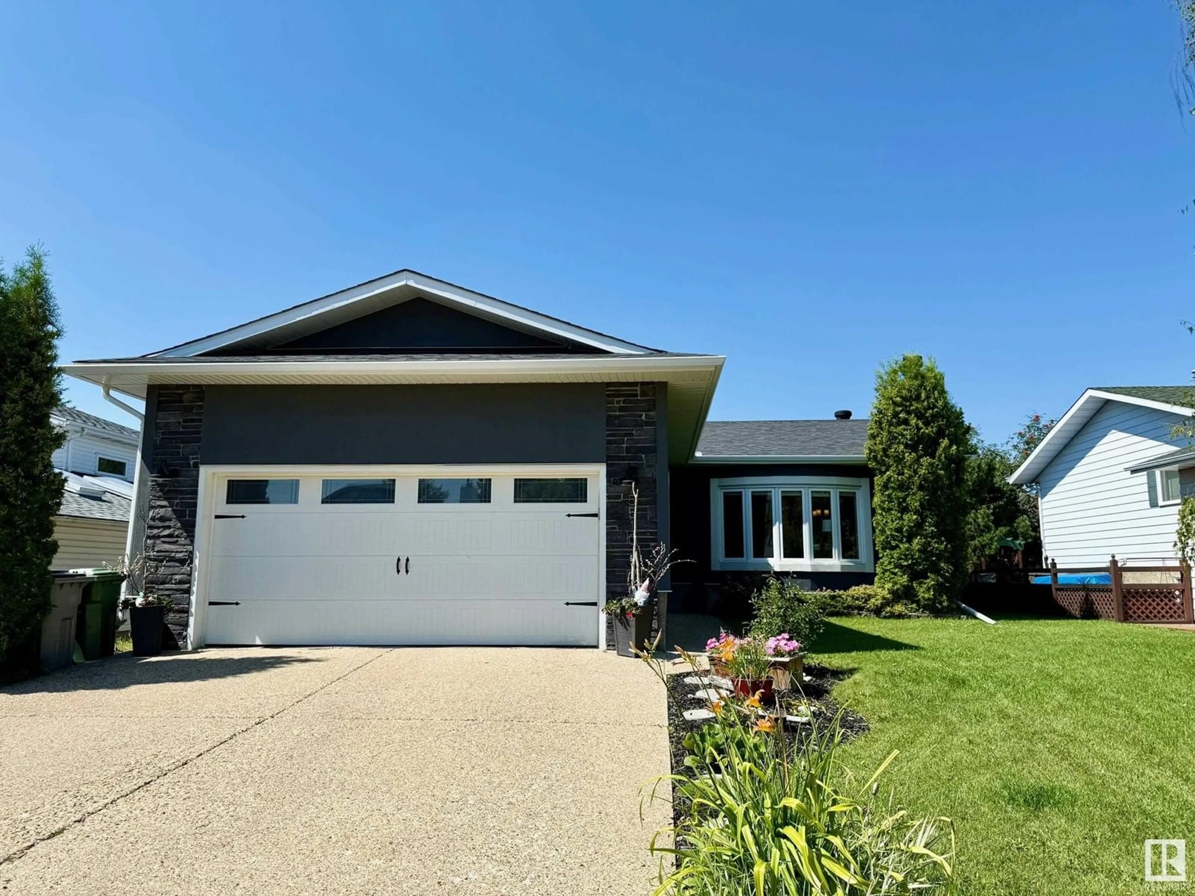 Home with vinyl exterior material, street for 5510 59 ST, Beaumont Alberta T4X1B2