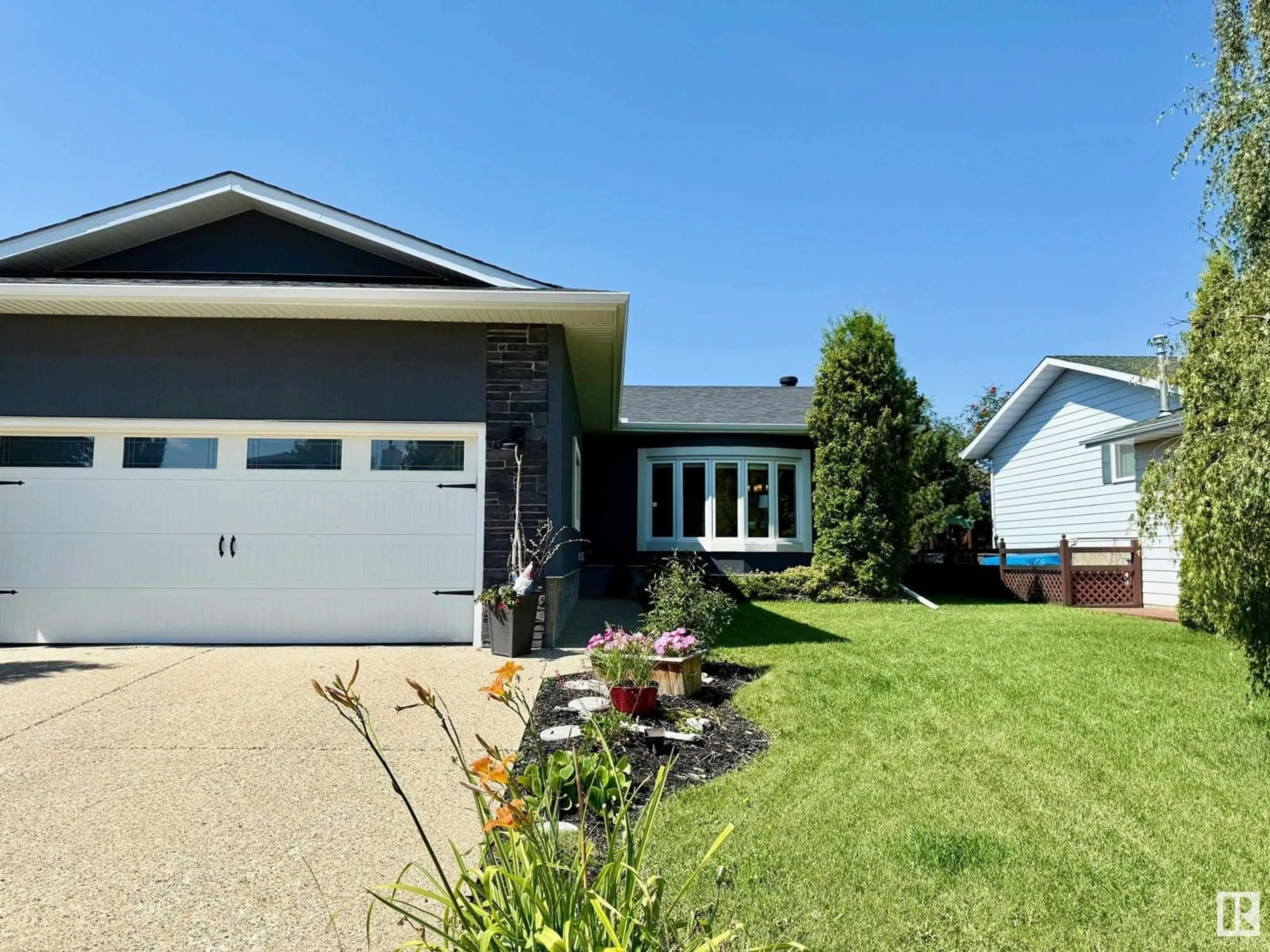 Home with vinyl exterior material, street for 5510 59 ST, Beaumont Alberta T4X1B2