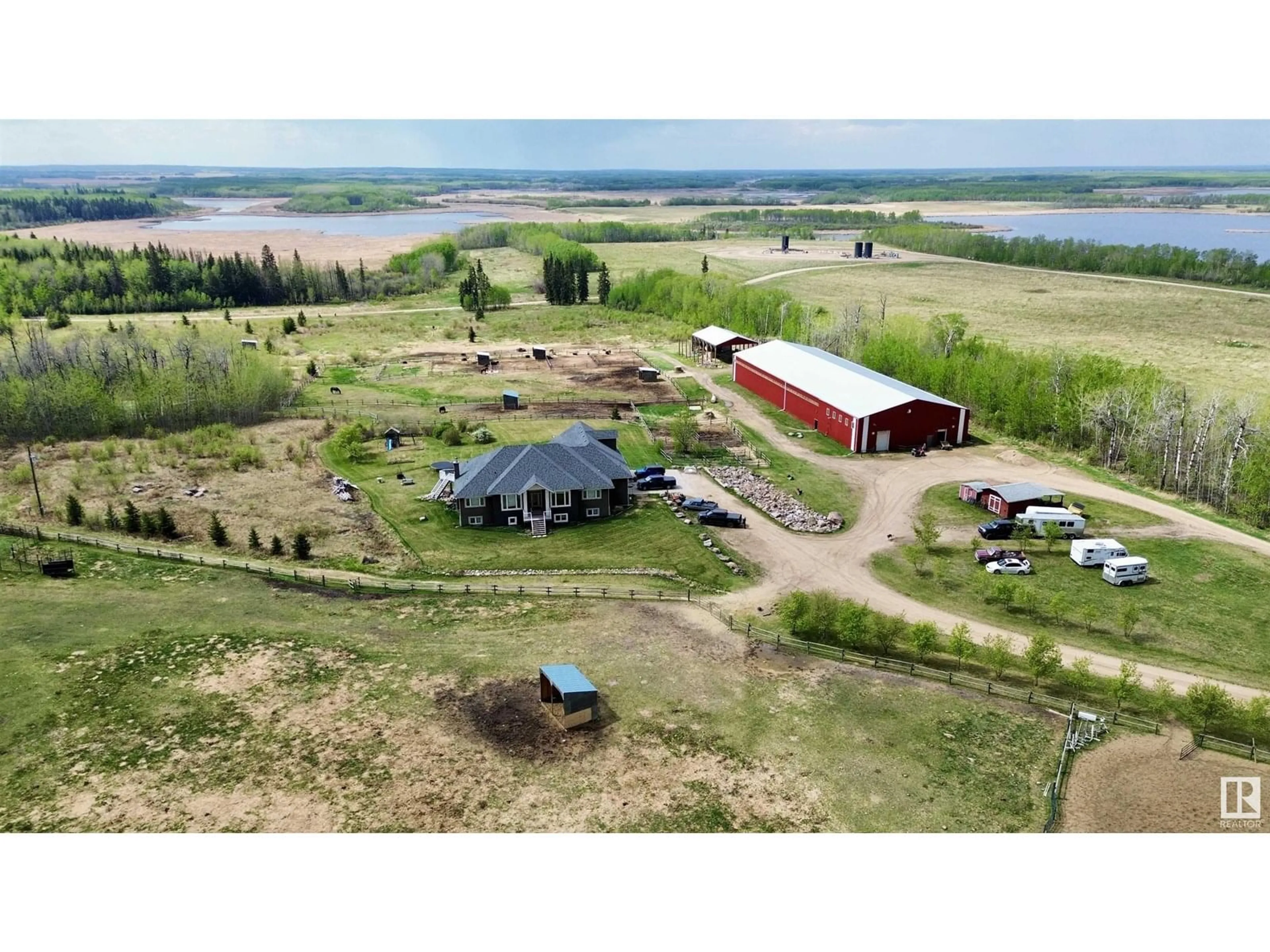 A pic from outside/outdoor area/front of a property/back of a property/a pic from drone, unknown for 61016 HWY 897, Rural Bonnyville M.D. Alberta T9M1P3