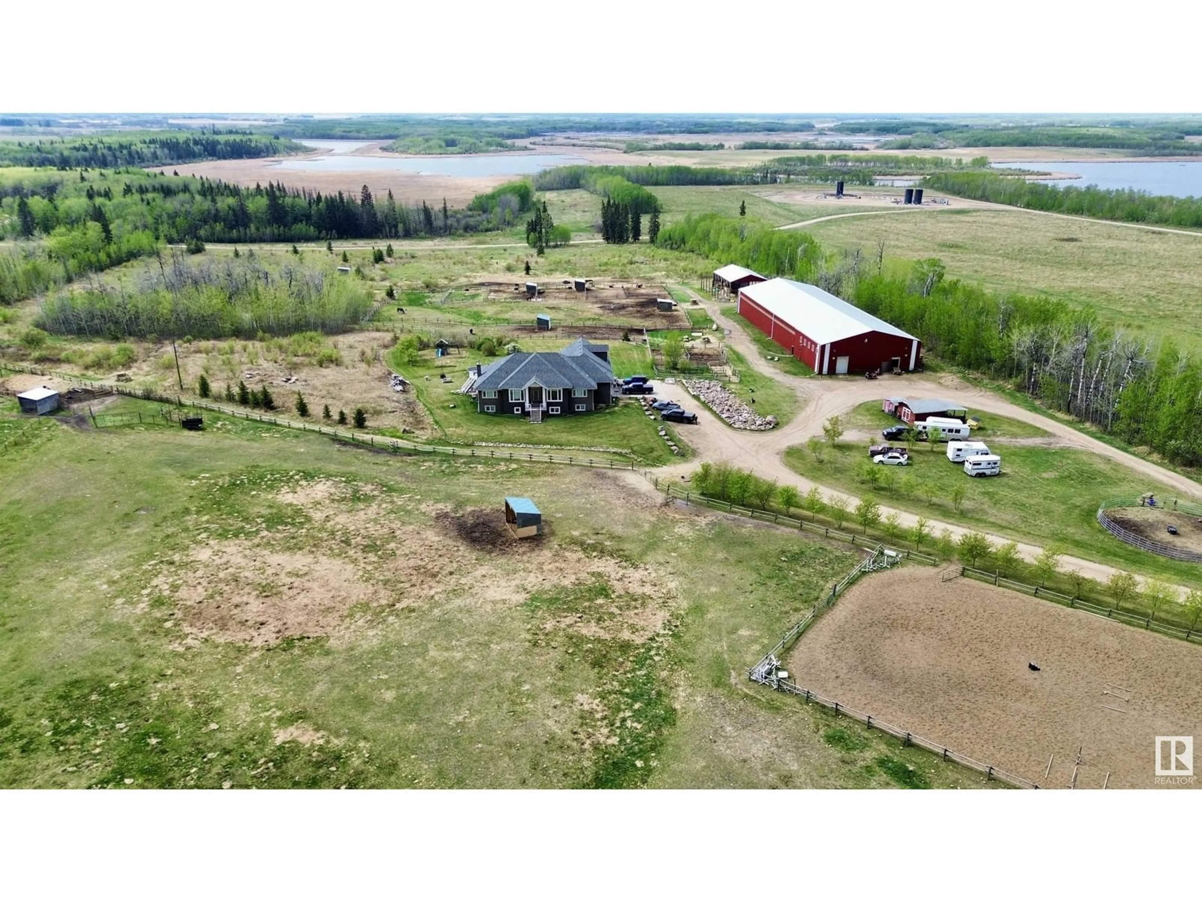 A pic from outside/outdoor area/front of a property/back of a property/a pic from drone, building for 61016 HWY 897, Rural Bonnyville M.D. Alberta T9M1P3