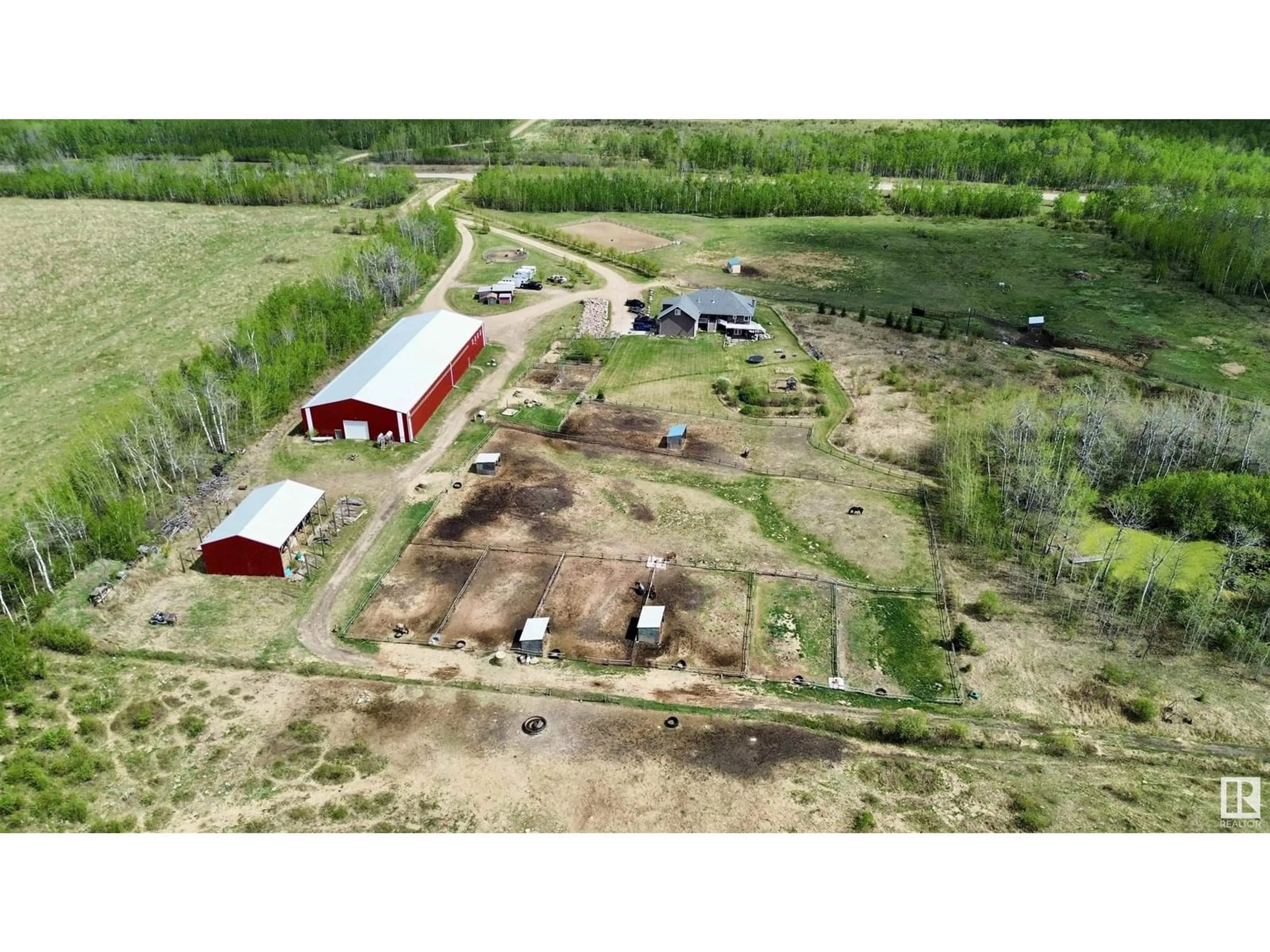 A pic from outside/outdoor area/front of a property/back of a property/a pic from drone, building for 61016 HWY 897, Rural Bonnyville M.D. Alberta T9M1P3
