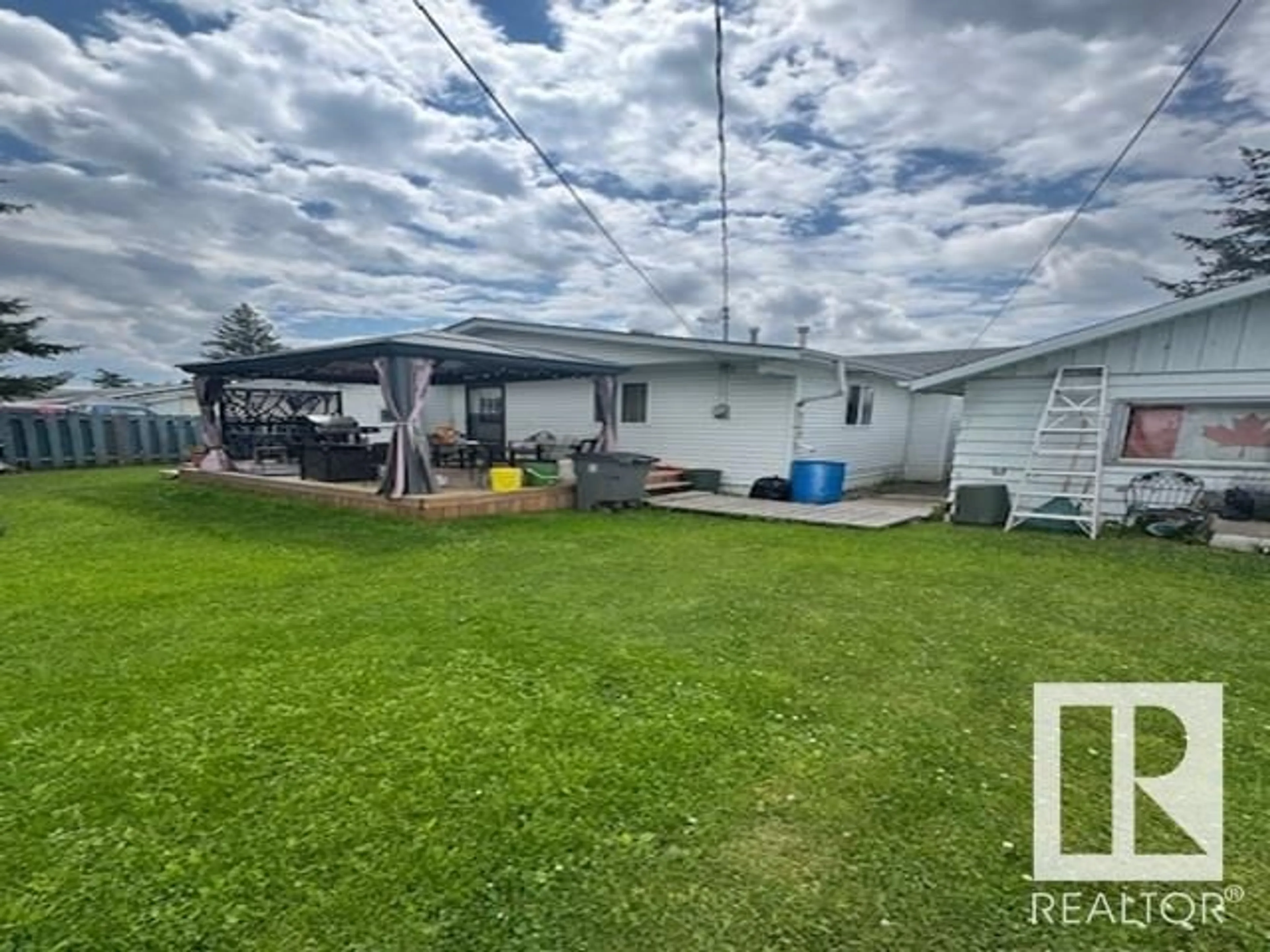 A pic from outside/outdoor area/front of a property/back of a property/a pic from drone, water/lake/river/ocean view for 4531 47 ST, Rural Lac Ste. Anne County Alberta T0E0A0