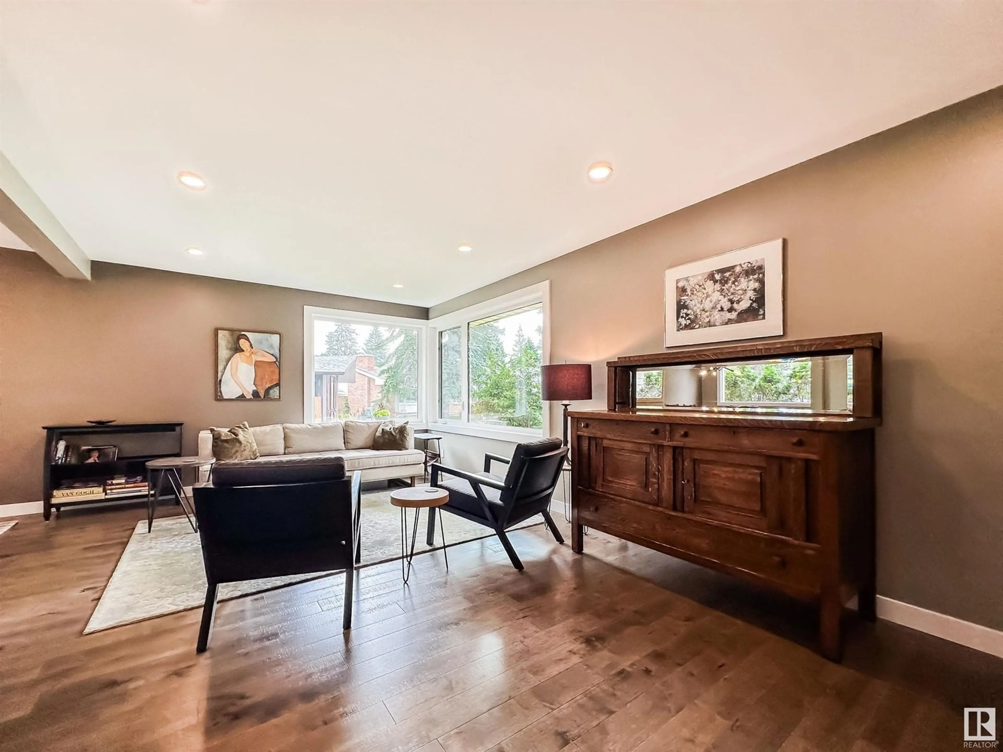 Living room with furniture, wood/laminate floor for NW - 13908 86 AV, Edmonton Alberta T5R4A9