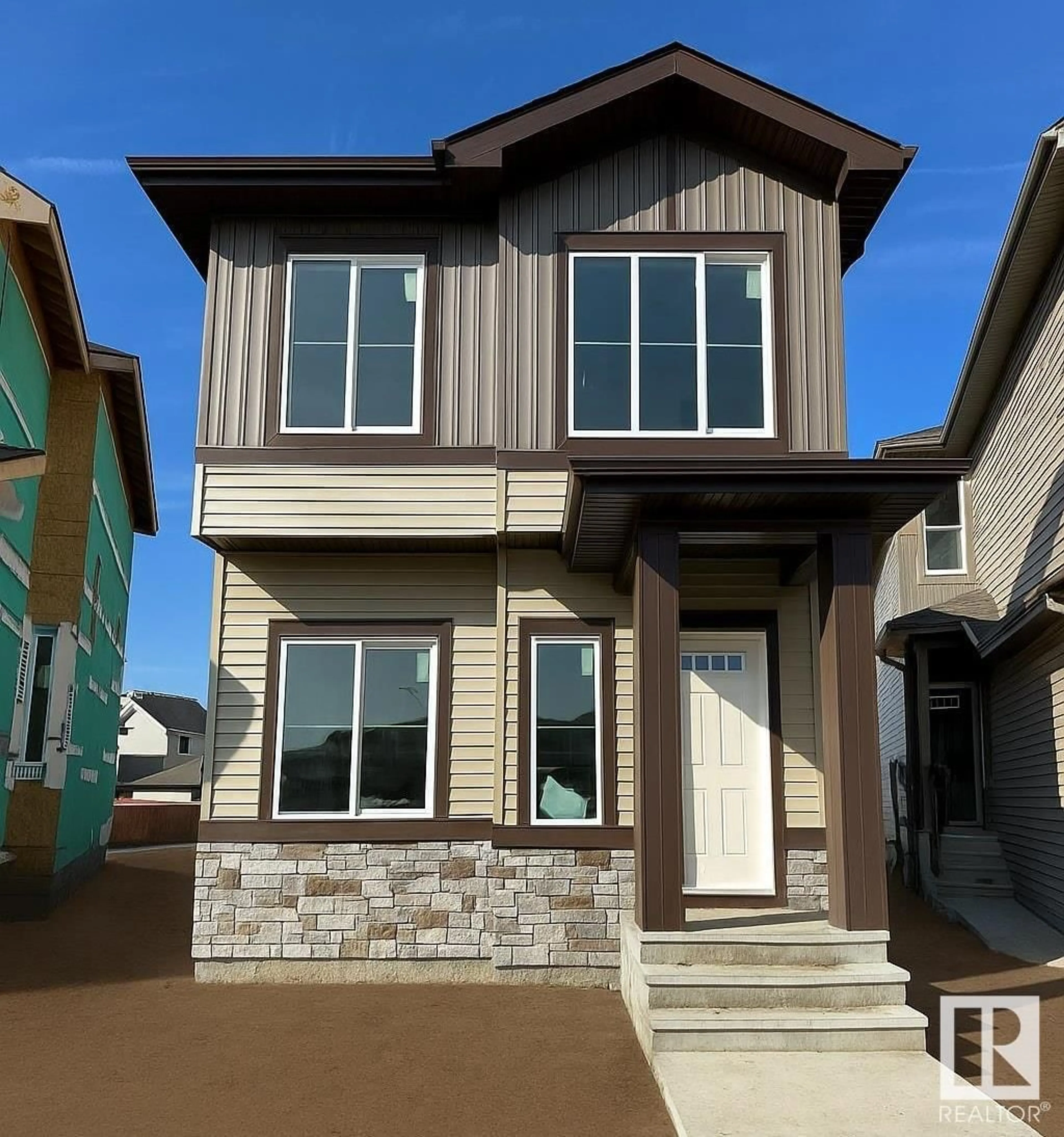 Home with vinyl exterior material, street for 11 SERENO LN, Fort Saskatchewan Alberta T8L0Z9