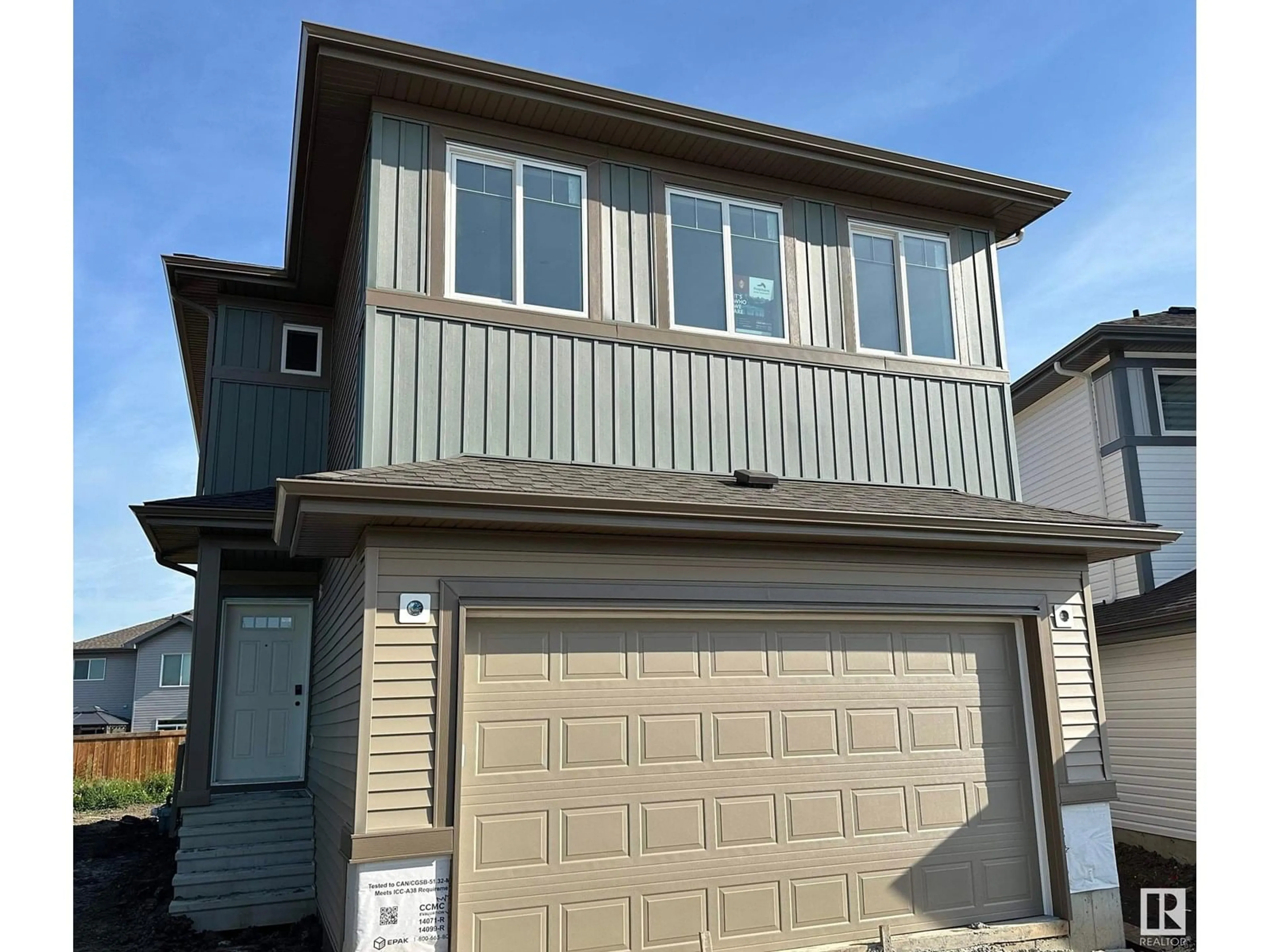 Home with vinyl exterior material, street for 22 SERENO LN, Fort Saskatchewan Alberta T8L0Z9