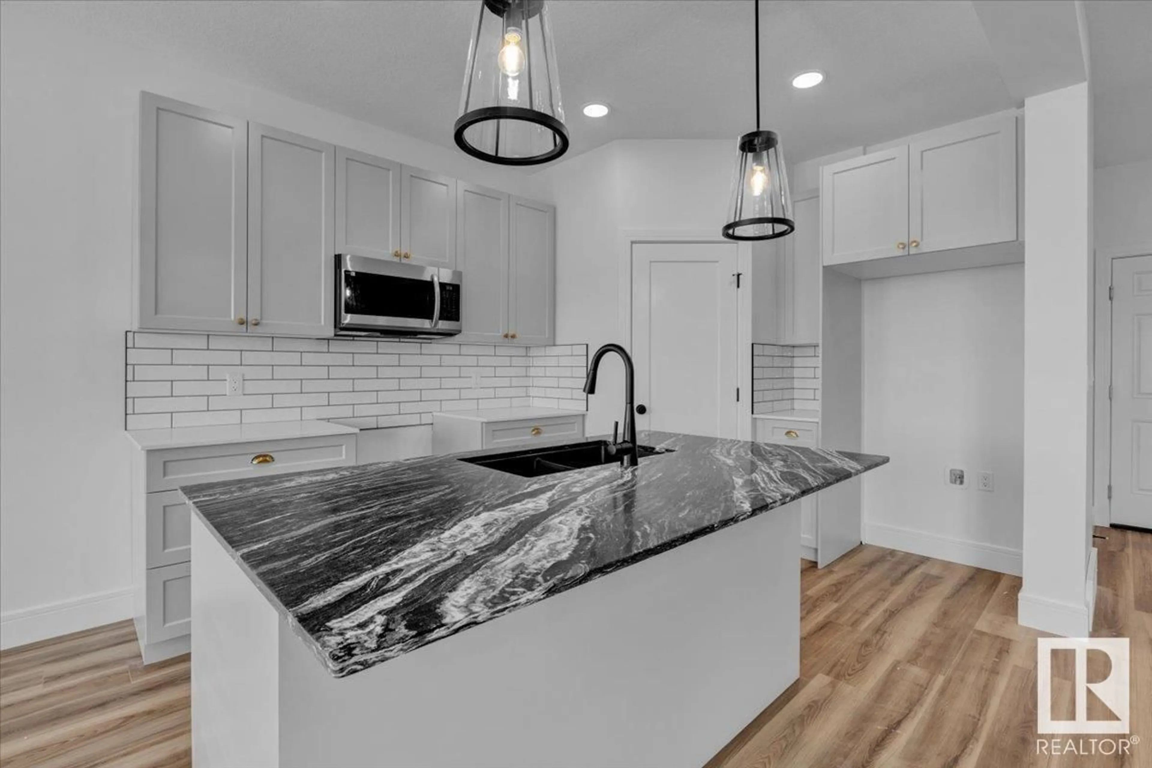 Open concept kitchen, ceramic/tile floor for 22 SERENO LN, Fort Saskatchewan Alberta T8L0Z9