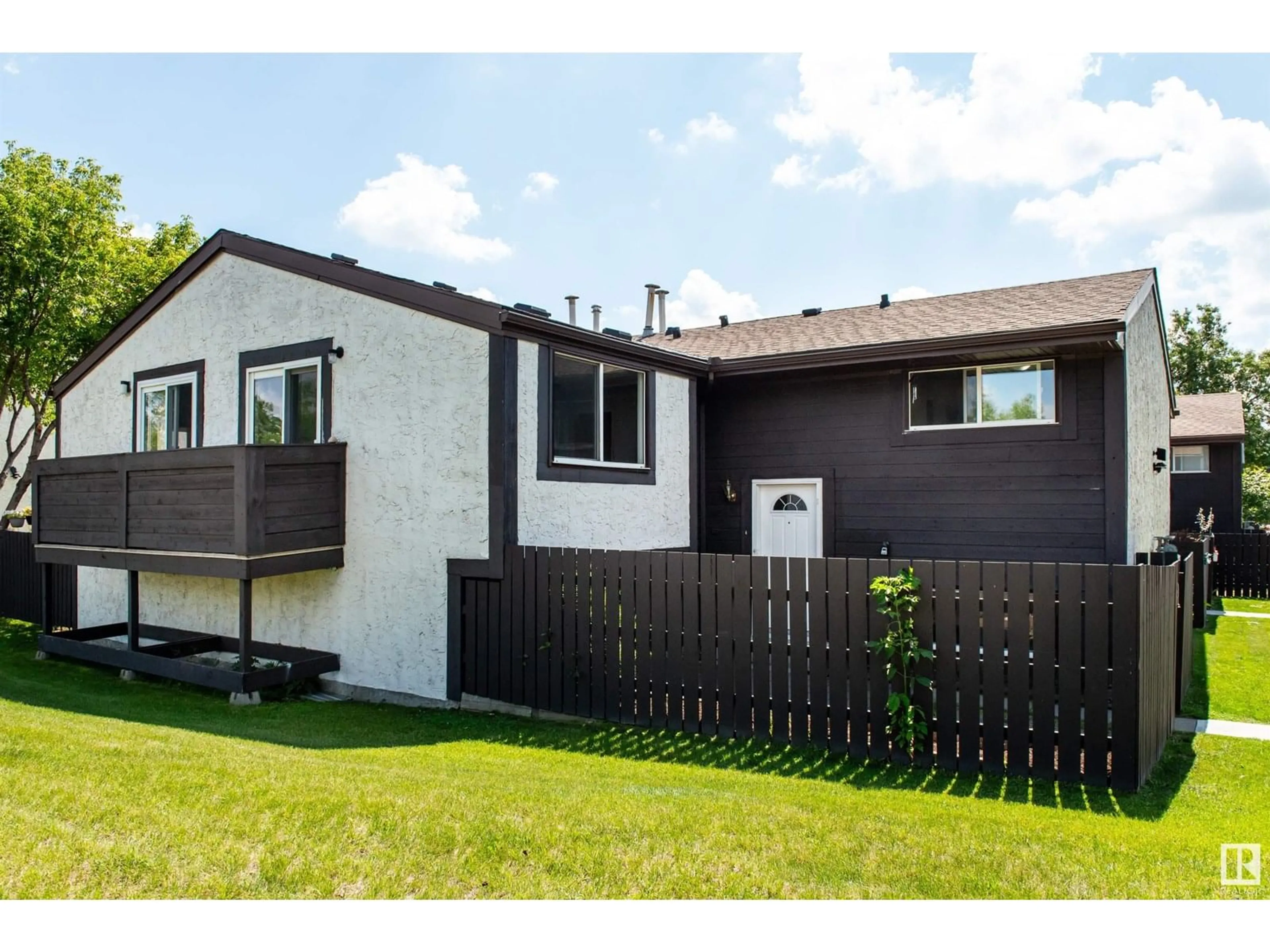Home with vinyl exterior material, street for NW - 1564 69 ST, Edmonton Alberta T6K3R3
