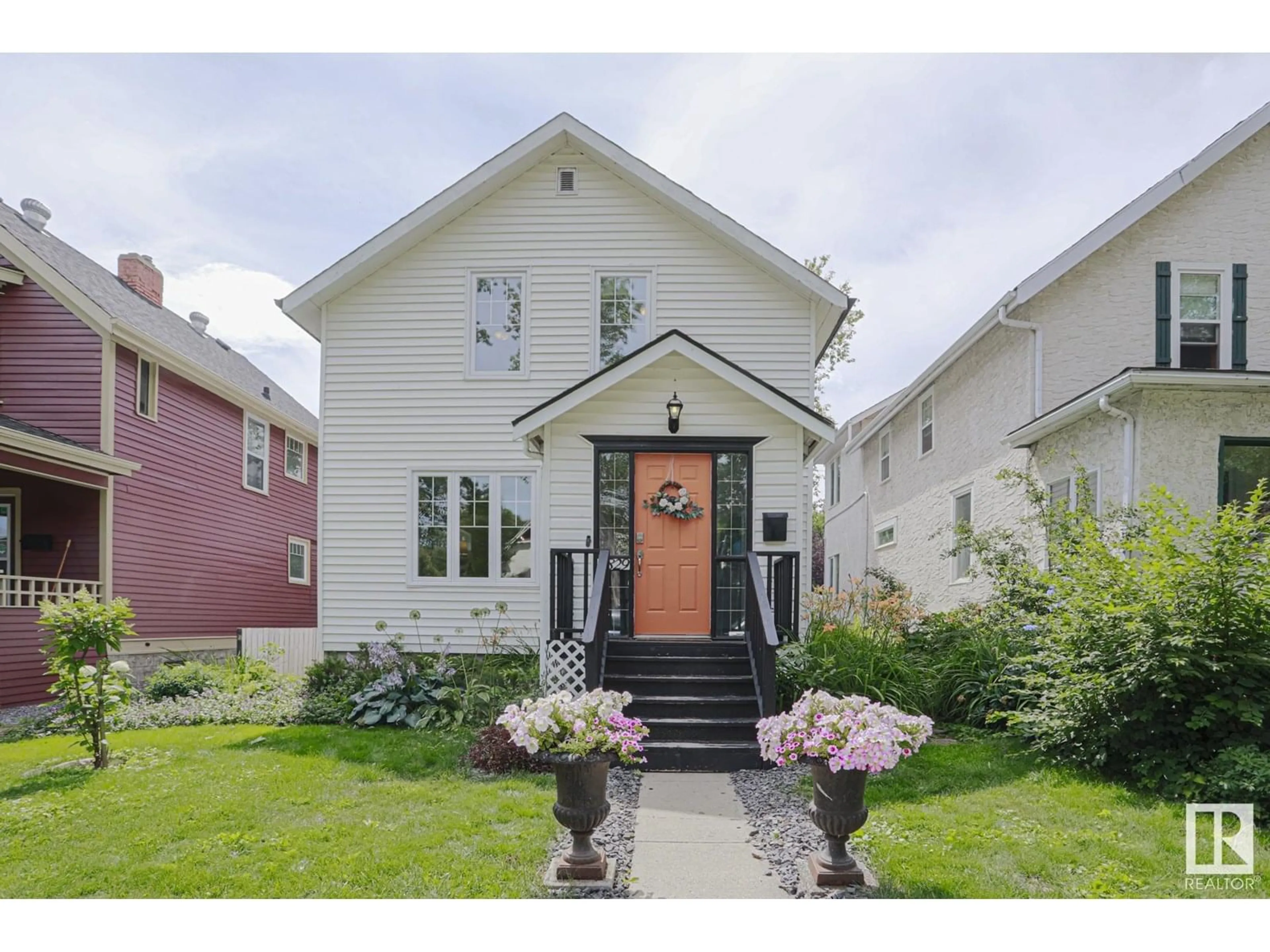 Home with vinyl exterior material, street for NW - 9829 88 AV, Edmonton Alberta T6E2R2