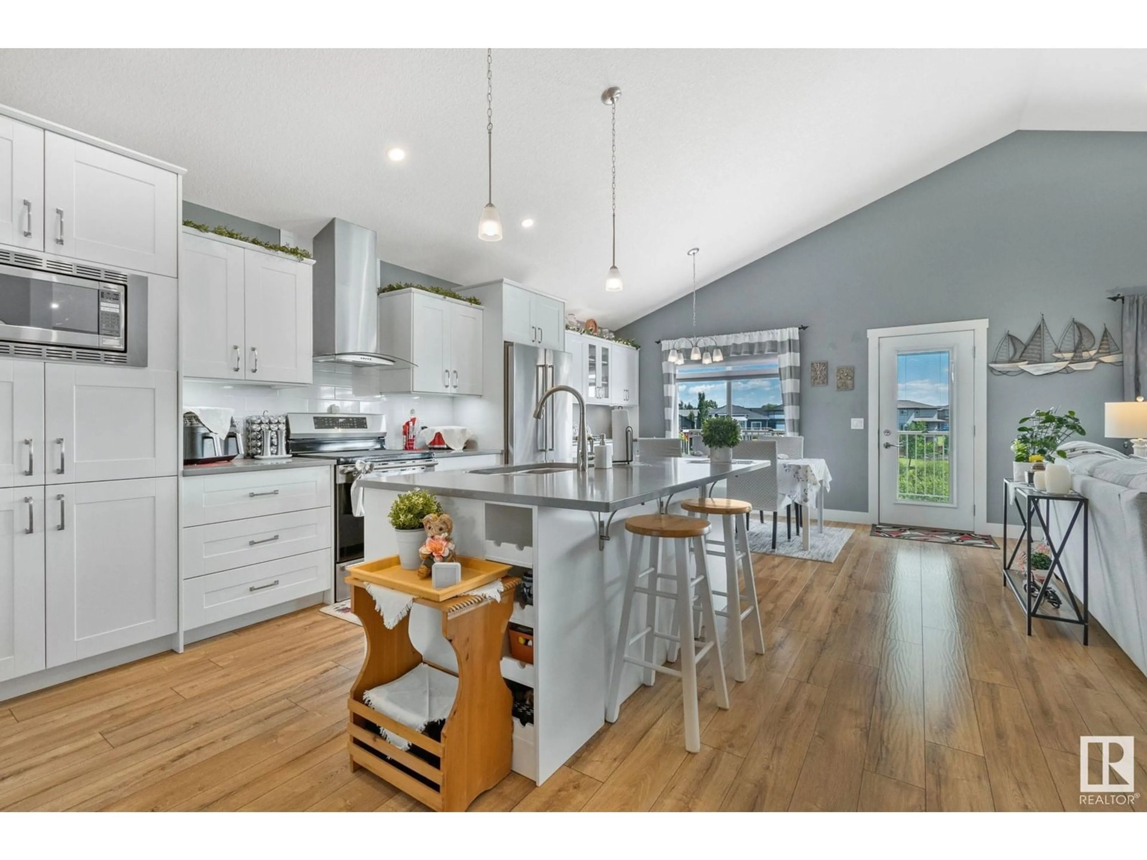 Open concept kitchen, wood/laminate floor for 17 SOUTHBRIDGE DR, Calmar Alberta T0C0V0