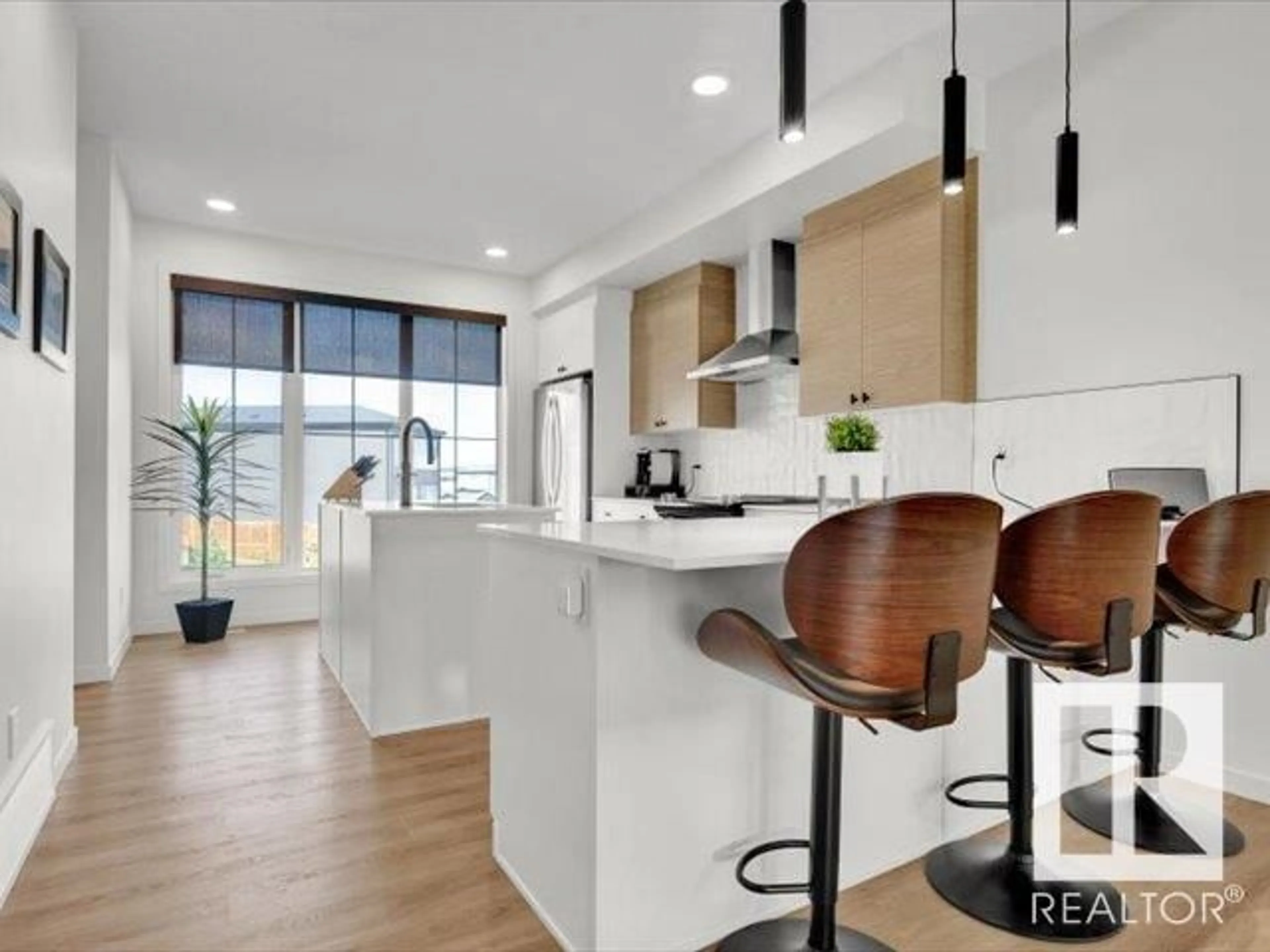 Open concept kitchen, wood/laminate floor for SW - 439 39 ST, Edmonton Alberta T6X2X9