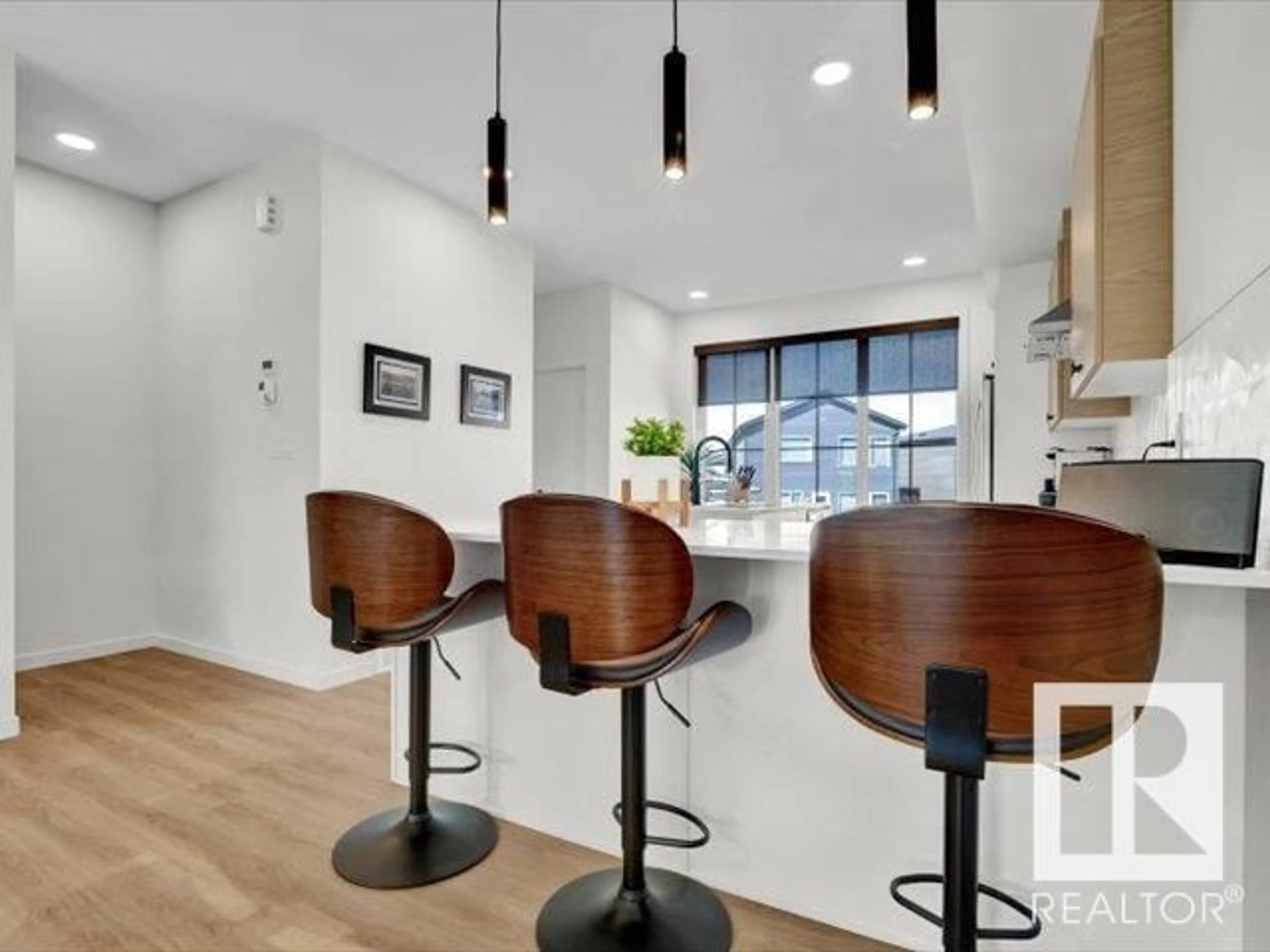 Open concept kitchen, wood/laminate floor for SW - 439 39 ST, Edmonton Alberta T6X2X9