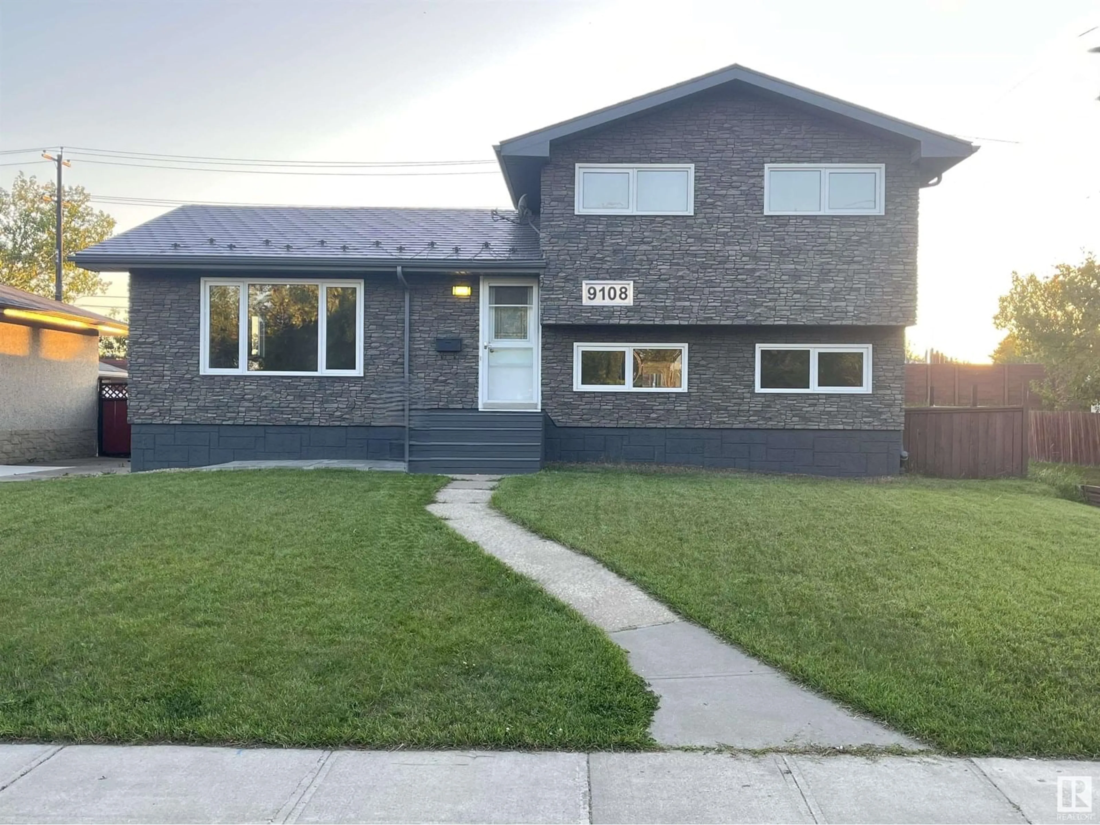 Home with vinyl exterior material, street for 9108 169 ST NW, Edmonton Alberta T5R2X1