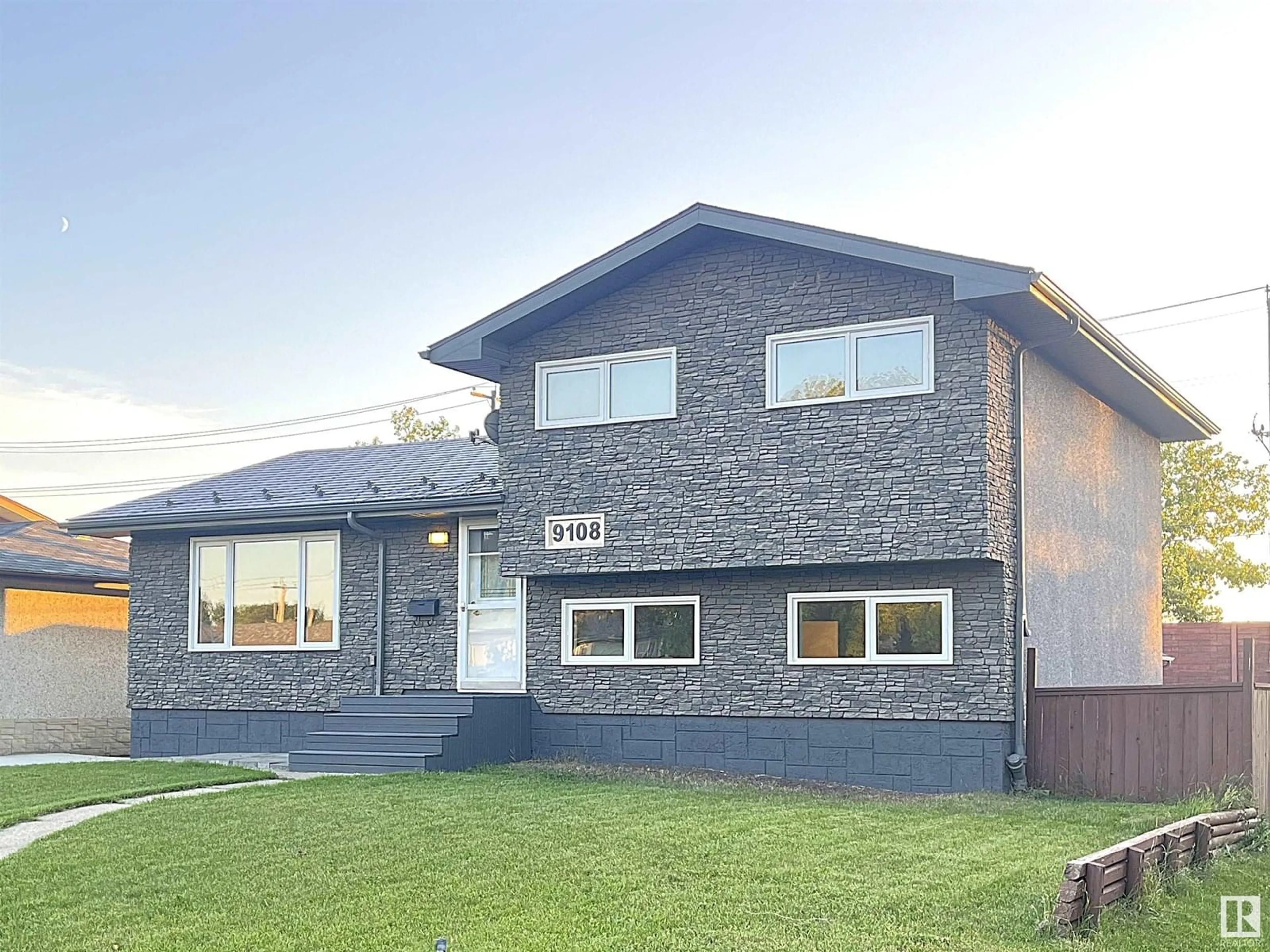 Home with vinyl exterior material, street for 9108 169 ST NW, Edmonton Alberta T5R2X1