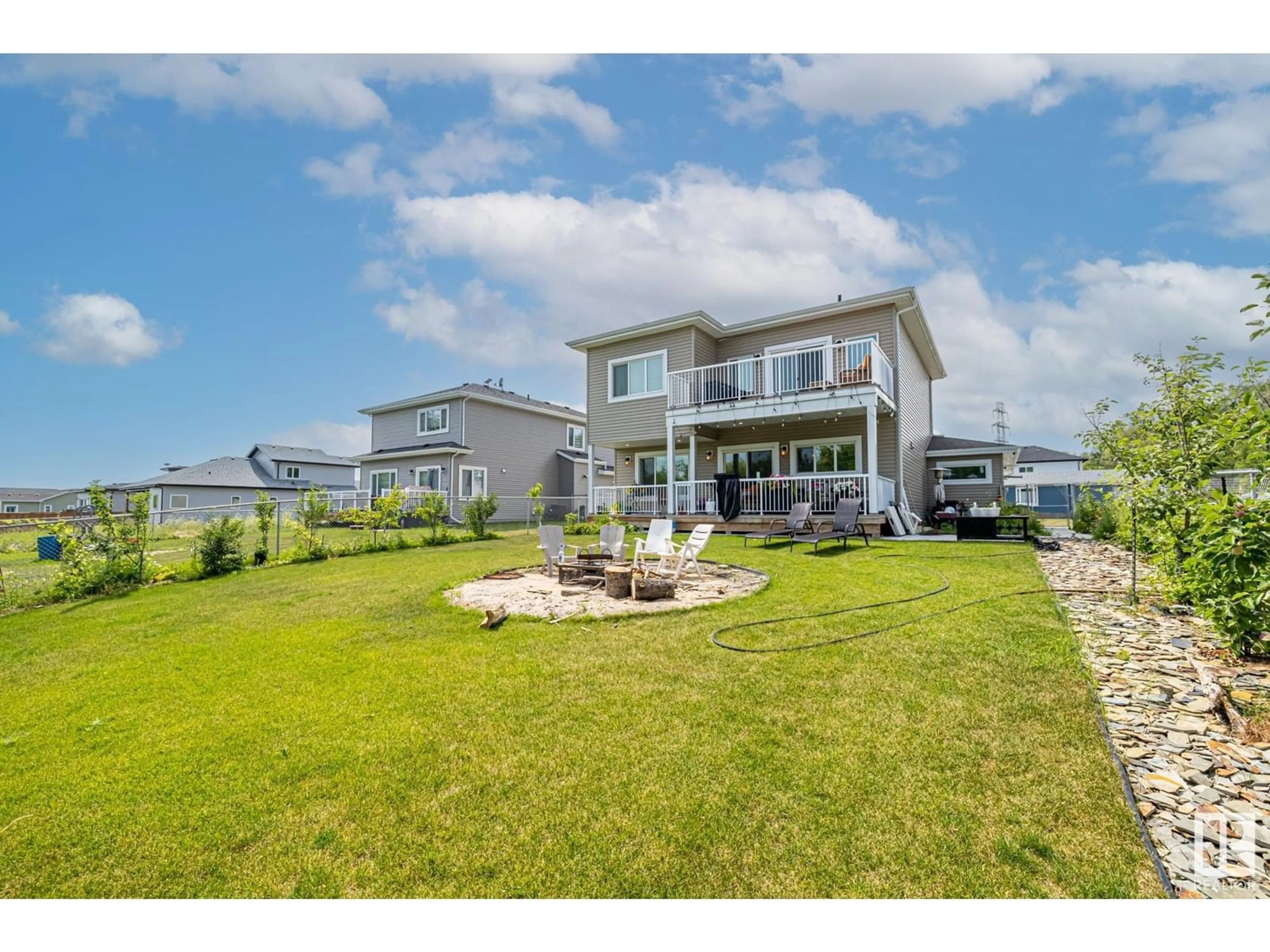 A pic from outside/outdoor area/front of a property/back of a property/a pic from drone, water/lake/river/ocean view for 55 - 5225 55 ST, Wabamun Alberta T0E2K0