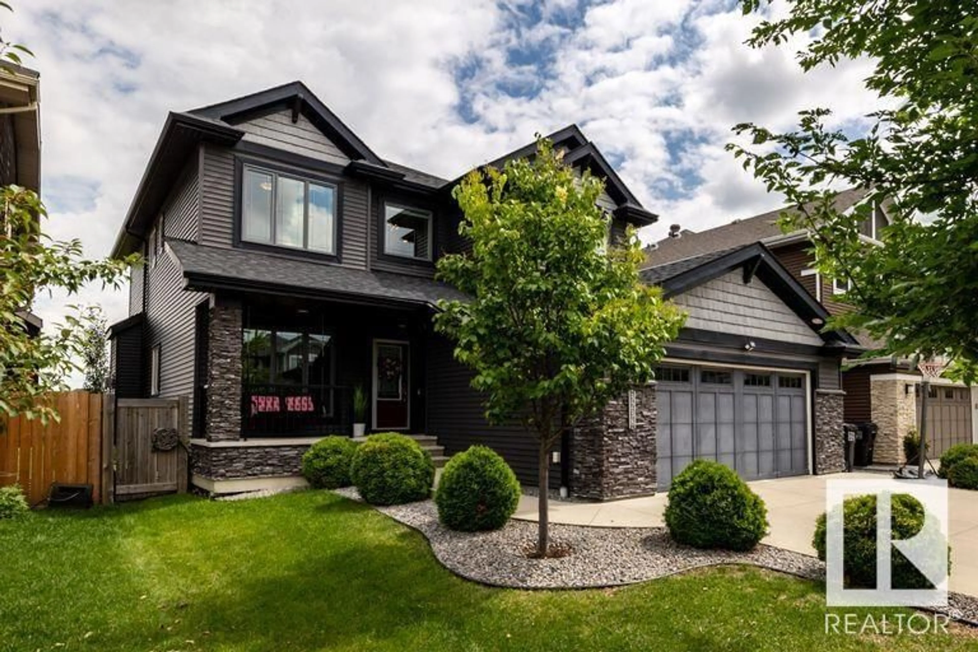 Home with brick exterior material, street for 3238 WINSPEAR CR, Edmonton Alberta T6X1P2