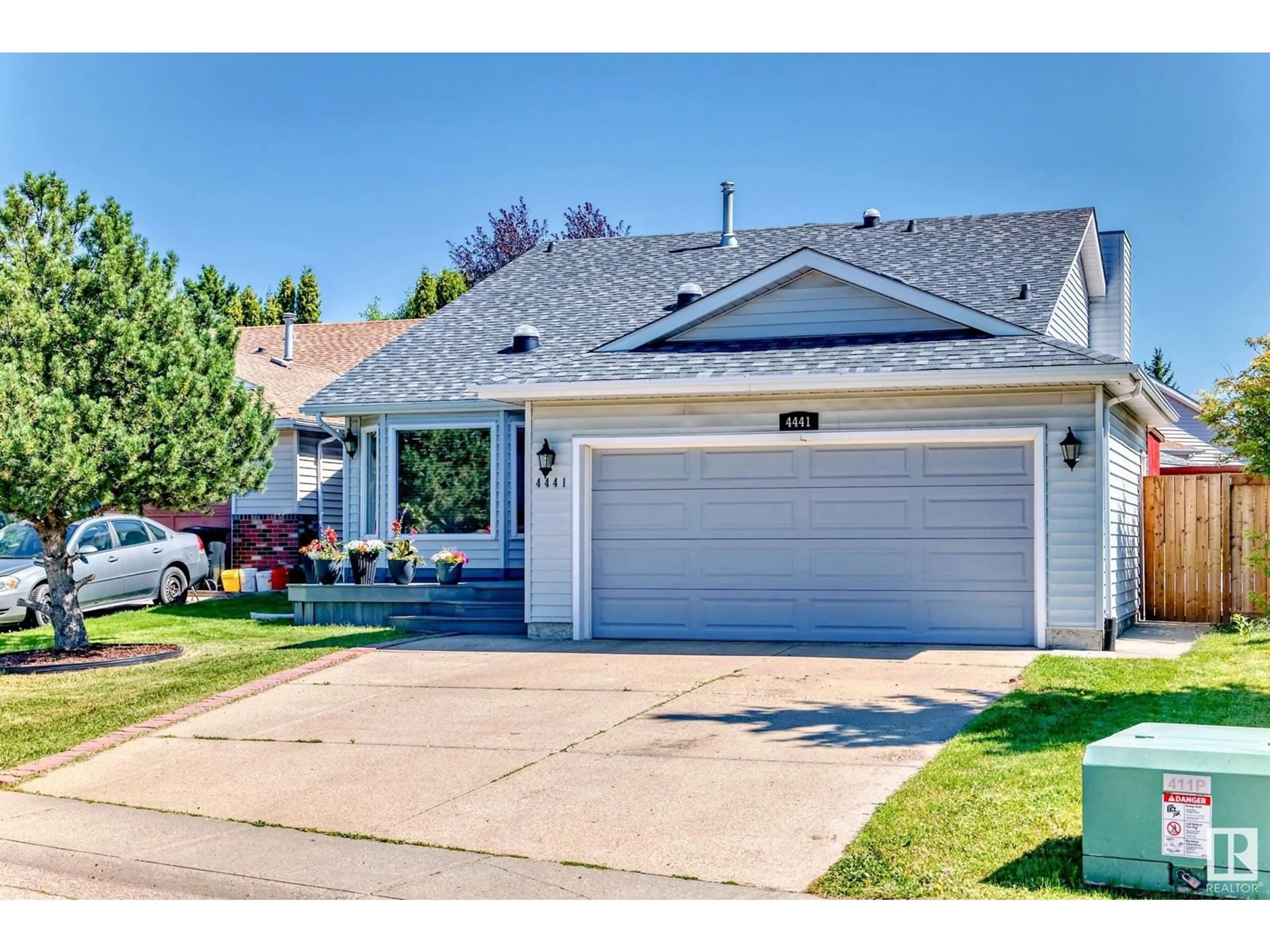 Home with vinyl exterior material, street for 4441 32 ST, Edmonton Alberta T6T1G5