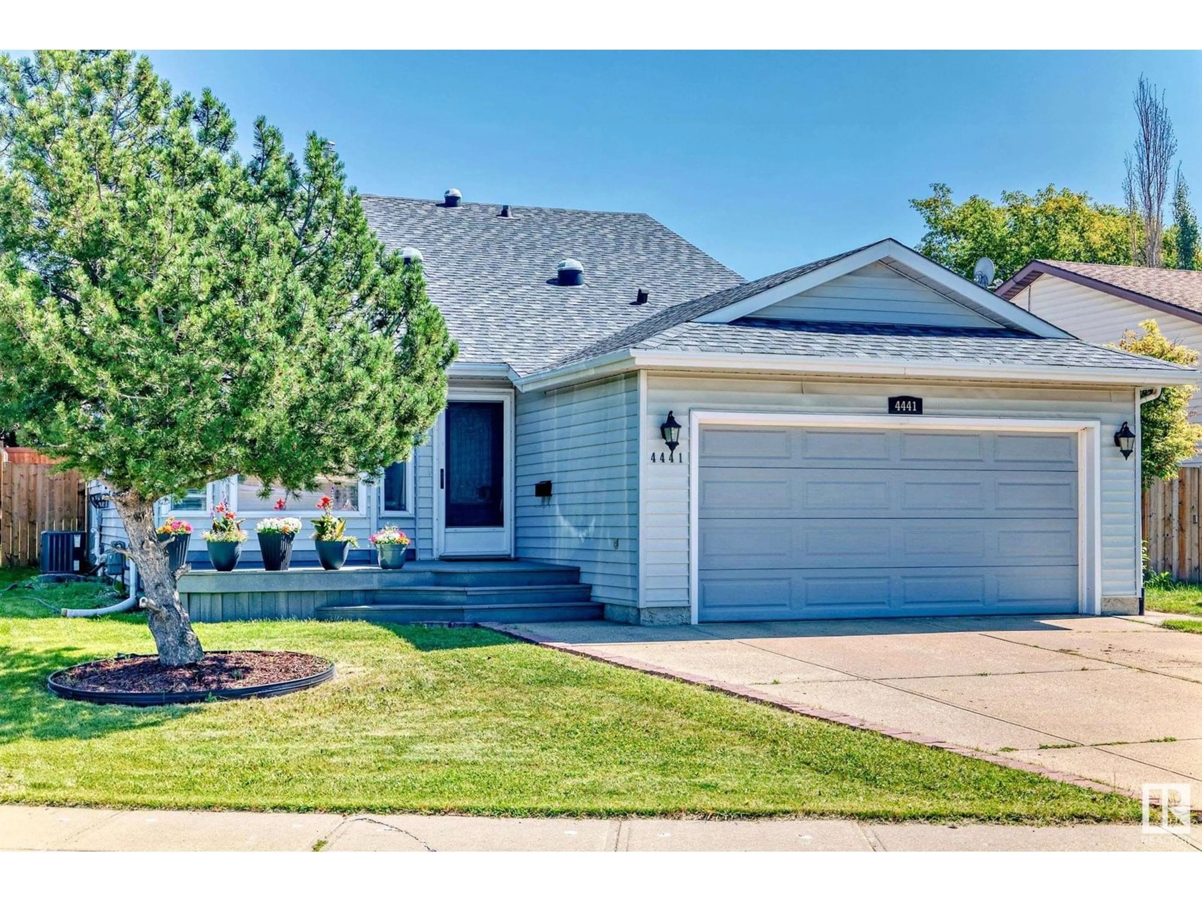 Home with vinyl exterior material, street for 4441 32 ST, Edmonton Alberta T6T1G5