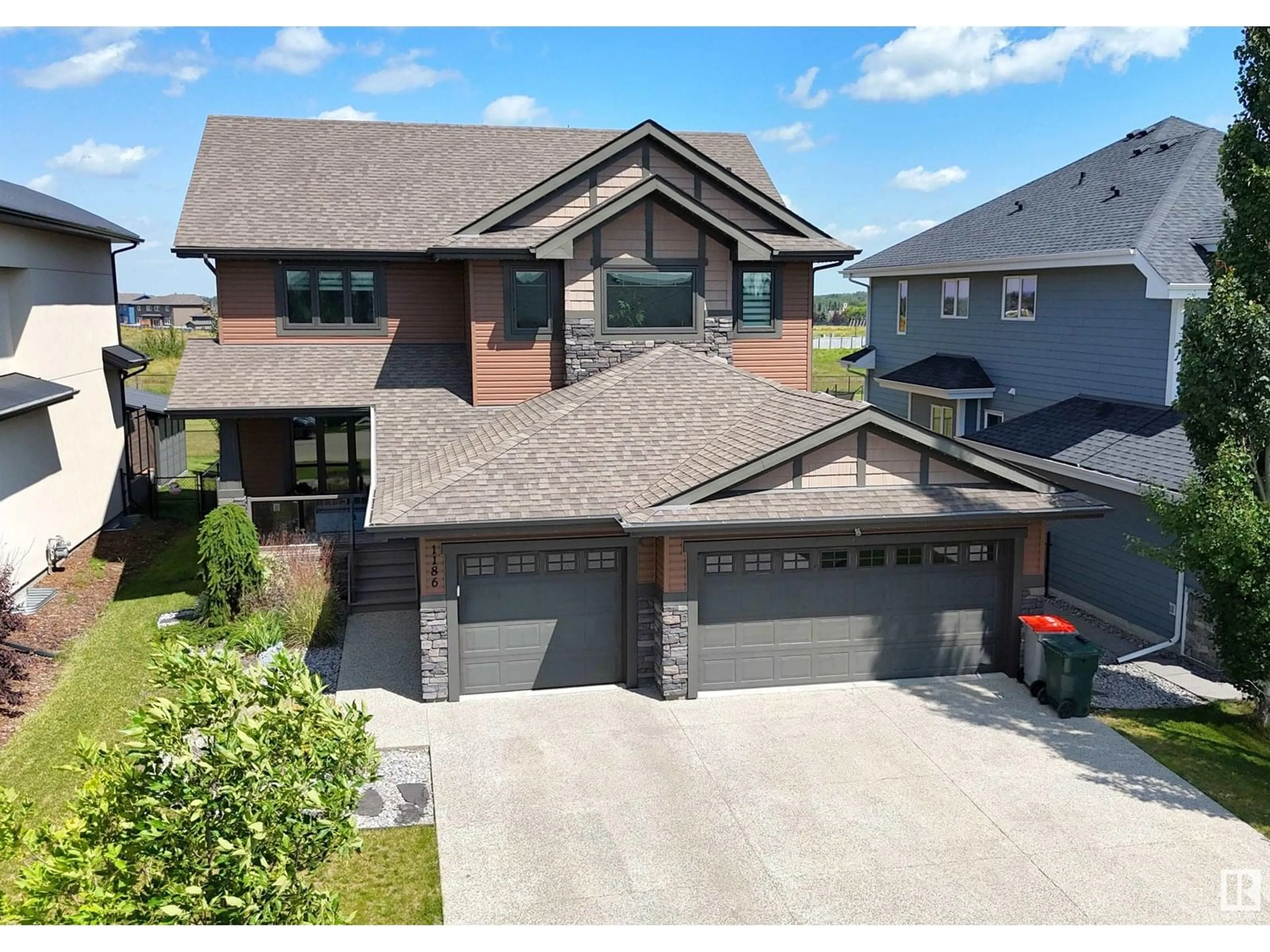 Home with brick exterior material, street for 1186 GENESIS LAKE BV, Stony Plain Alberta T7Z0K5