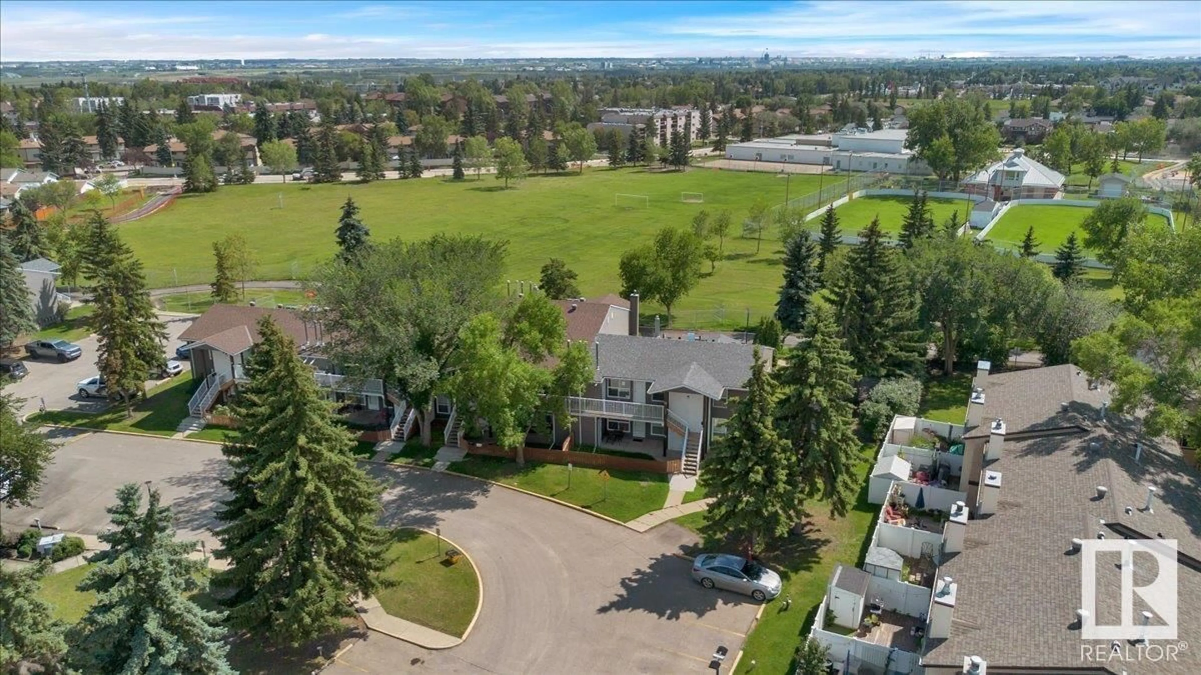 A pic from outside/outdoor area/front of a property/back of a property/a pic from drone, unknown for 23 - 3111 142 AV, Edmonton Alberta T5Y2H6