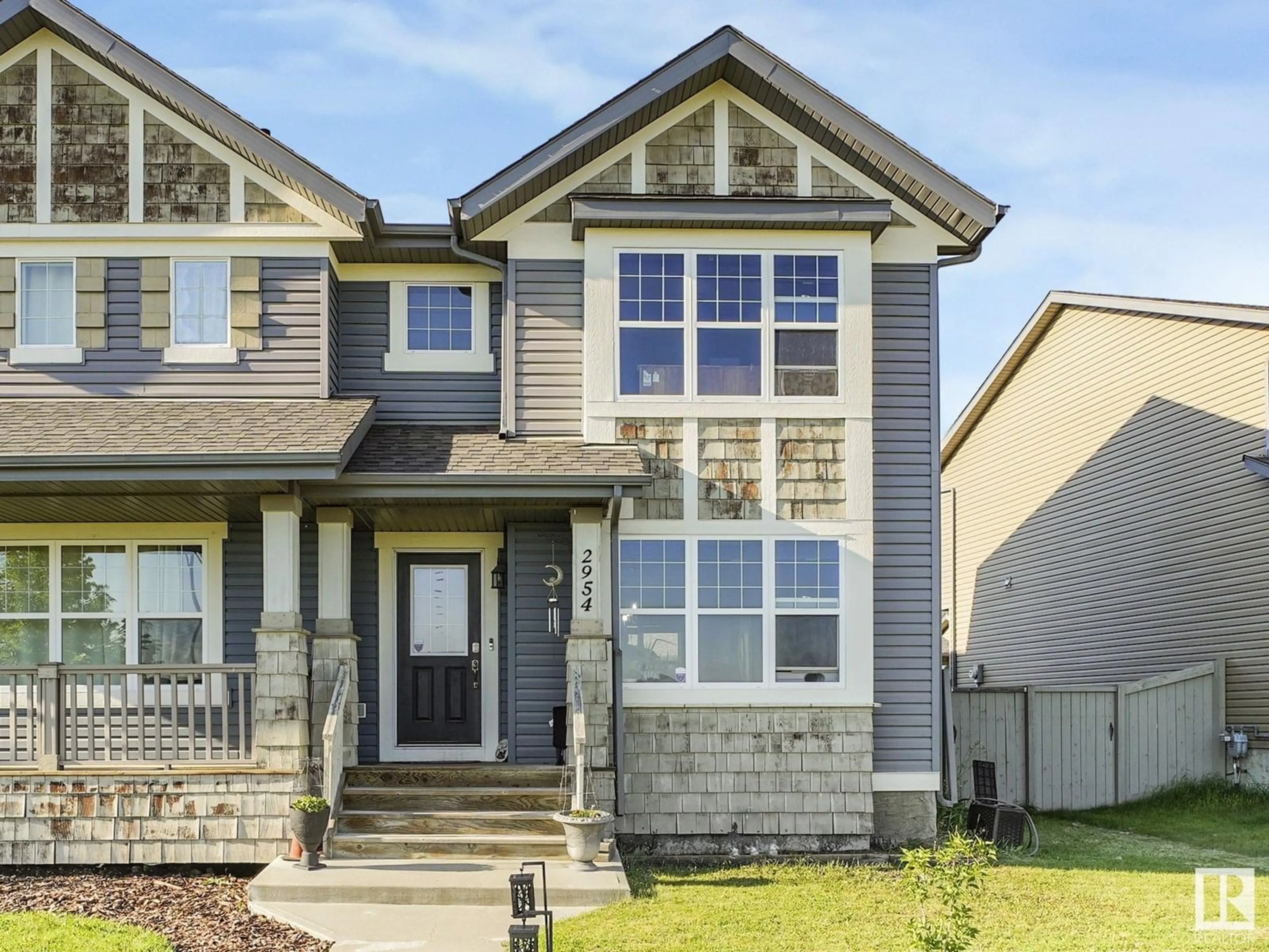 Home with vinyl exterior material, street for NW - 2954 18A AV, Edmonton Alberta T6T0N7