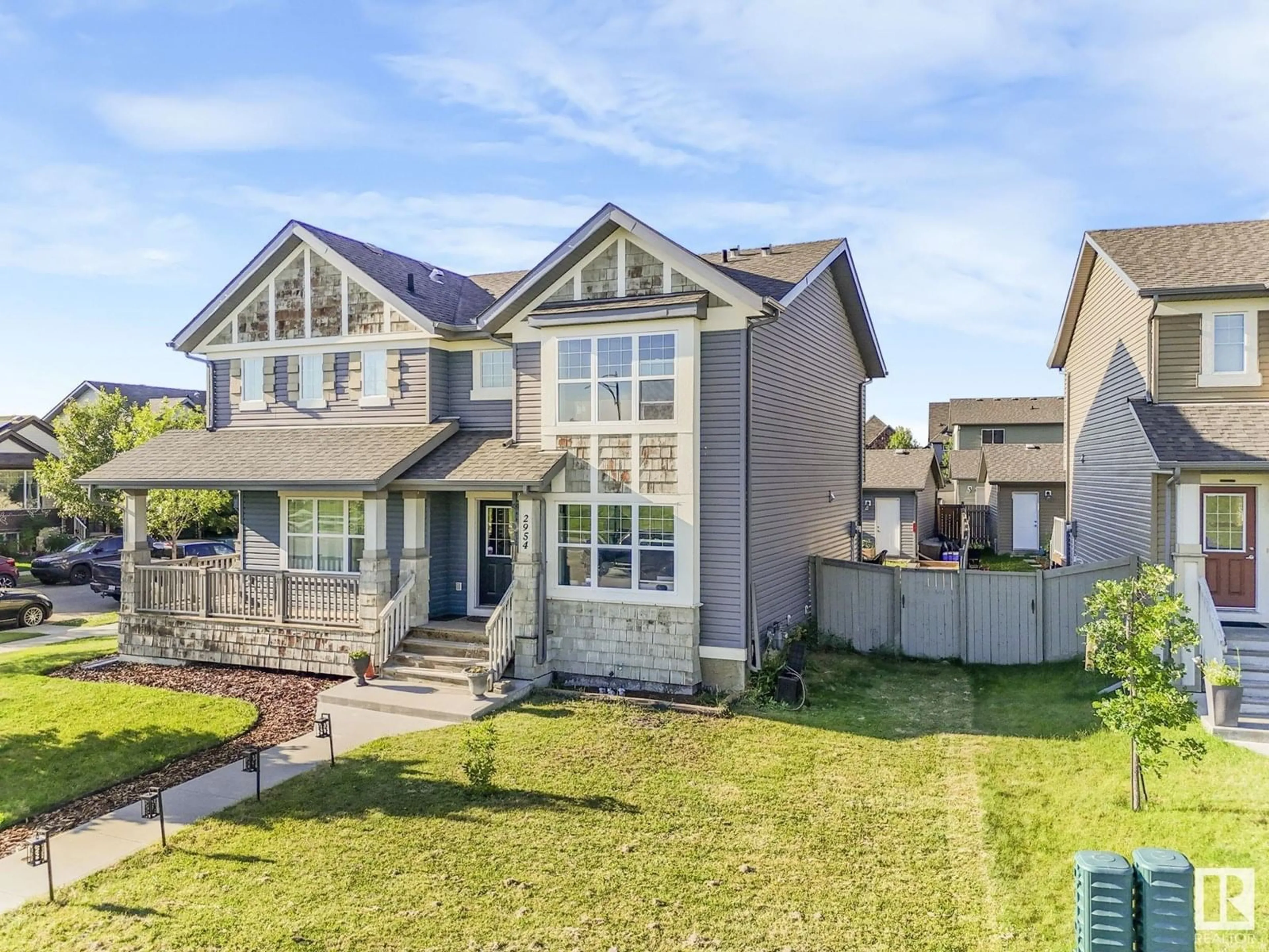 Home with vinyl exterior material, street for NW - 2954 18A AV, Edmonton Alberta T6T0N7