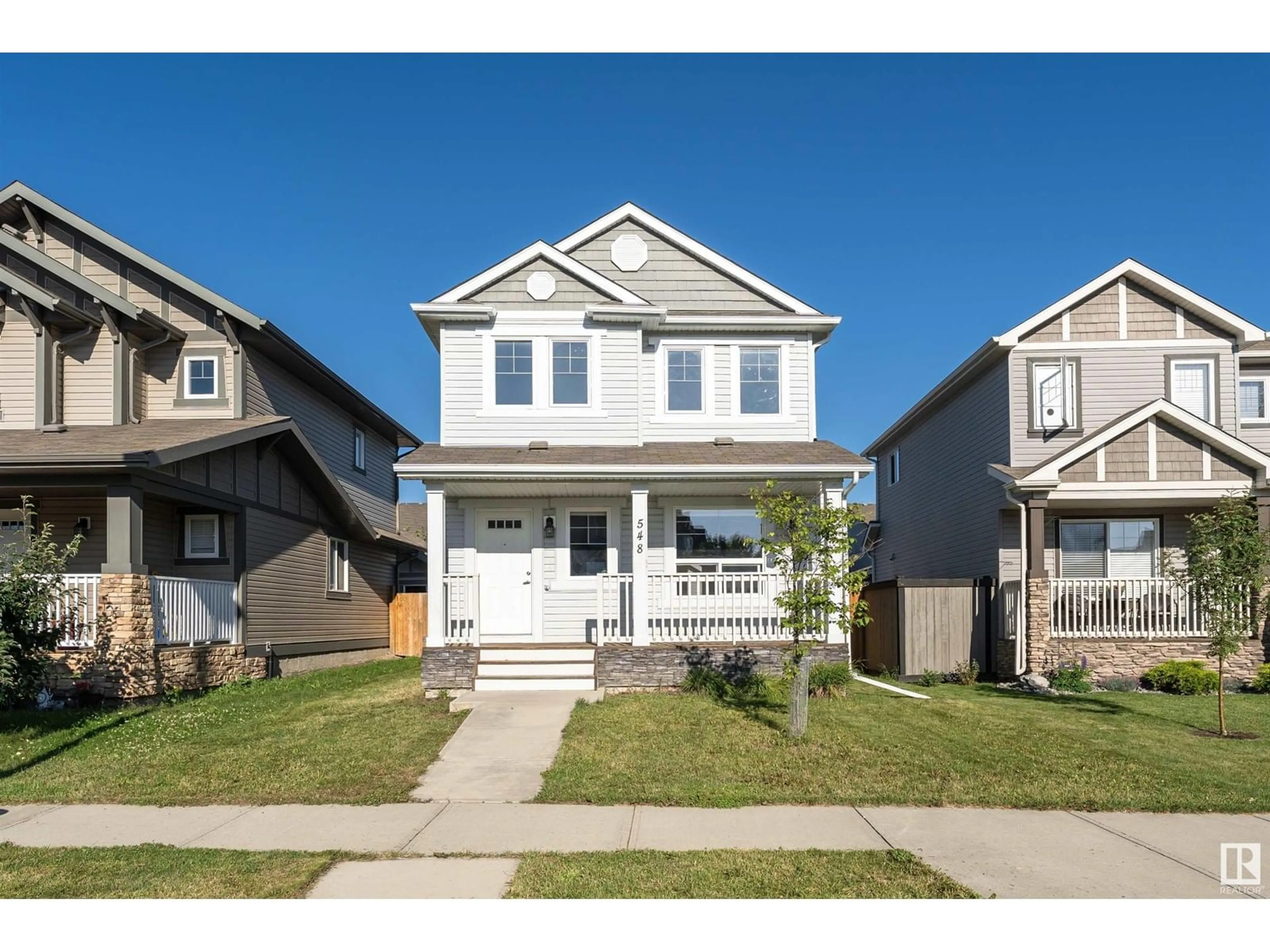 Home with vinyl exterior material, street for SW - 548 178A ST, Edmonton Alberta T6W2L4